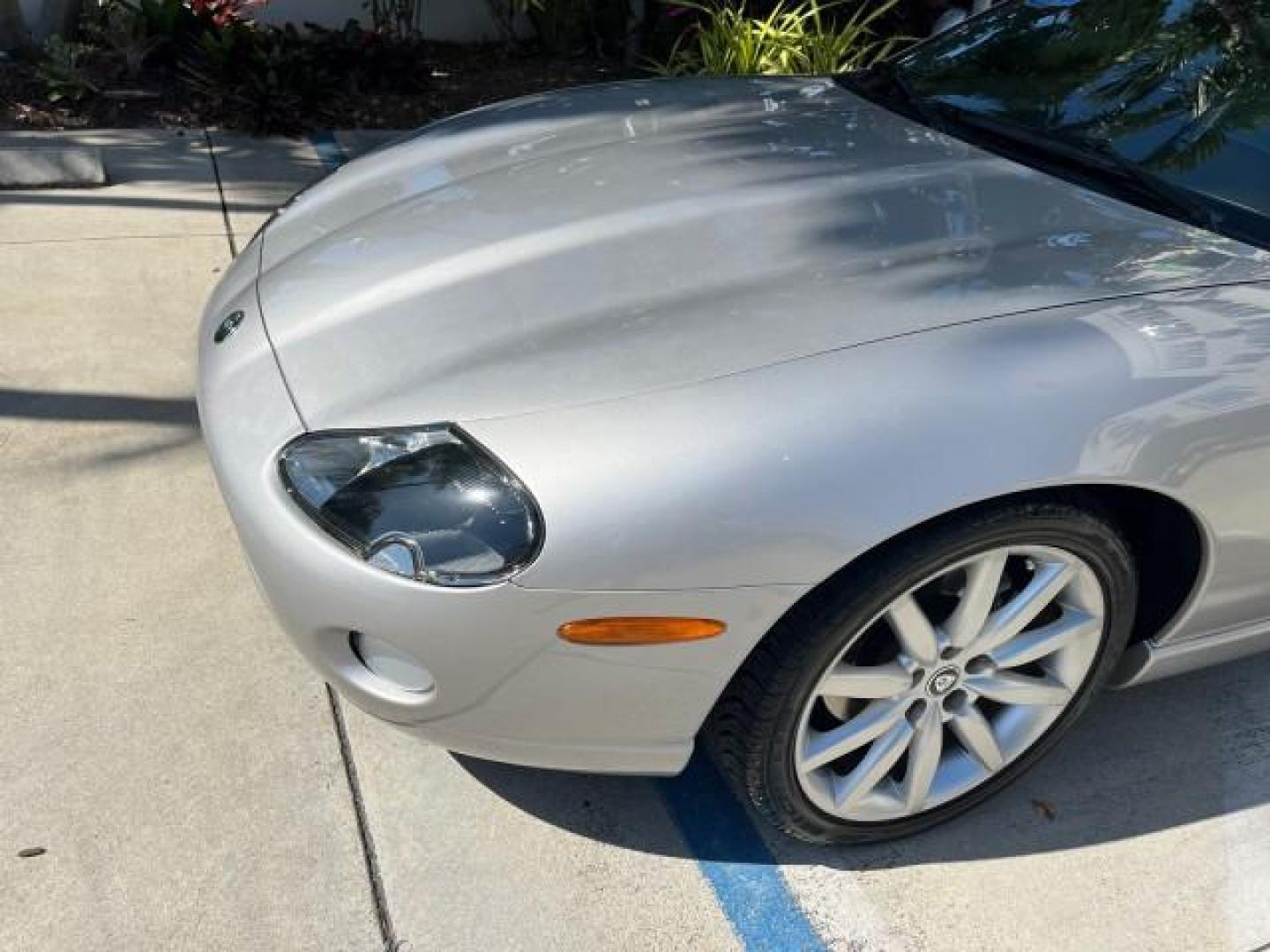 2005 Platinum /Charcoal Jaguar XK8 CONV LOW MILES 22,262 (SAJDA42C852) with an 4.2L DOHC EFI 32-Valve Aluminum Alloy V8 Engine engine, Automatic transmission, located at 4701 North Dixie Hwy, Pompano Beach, FL, 33064, (954) 422-2889, 26.240938, -80.123474 - 2005 JAGUAR XK-SERIES XK8 NEW $76,030 ROAD READY VIN: SAJDA42C852A44308 NO RECALLS 4.2L V8 CONVERTIBLE FLORIDA OWNER 4.2L V8 F DOHC POWER CONVERTIBLE TOP GASOLINE 9 SERVICE RECORDS POWER LEATHER SEATS REAR WHEEL DRIVE SUPER LOW MILES 22,262 PARKING SENSORS Alloy Wheels Anti-Theft System Auto-dimming - Photo#78