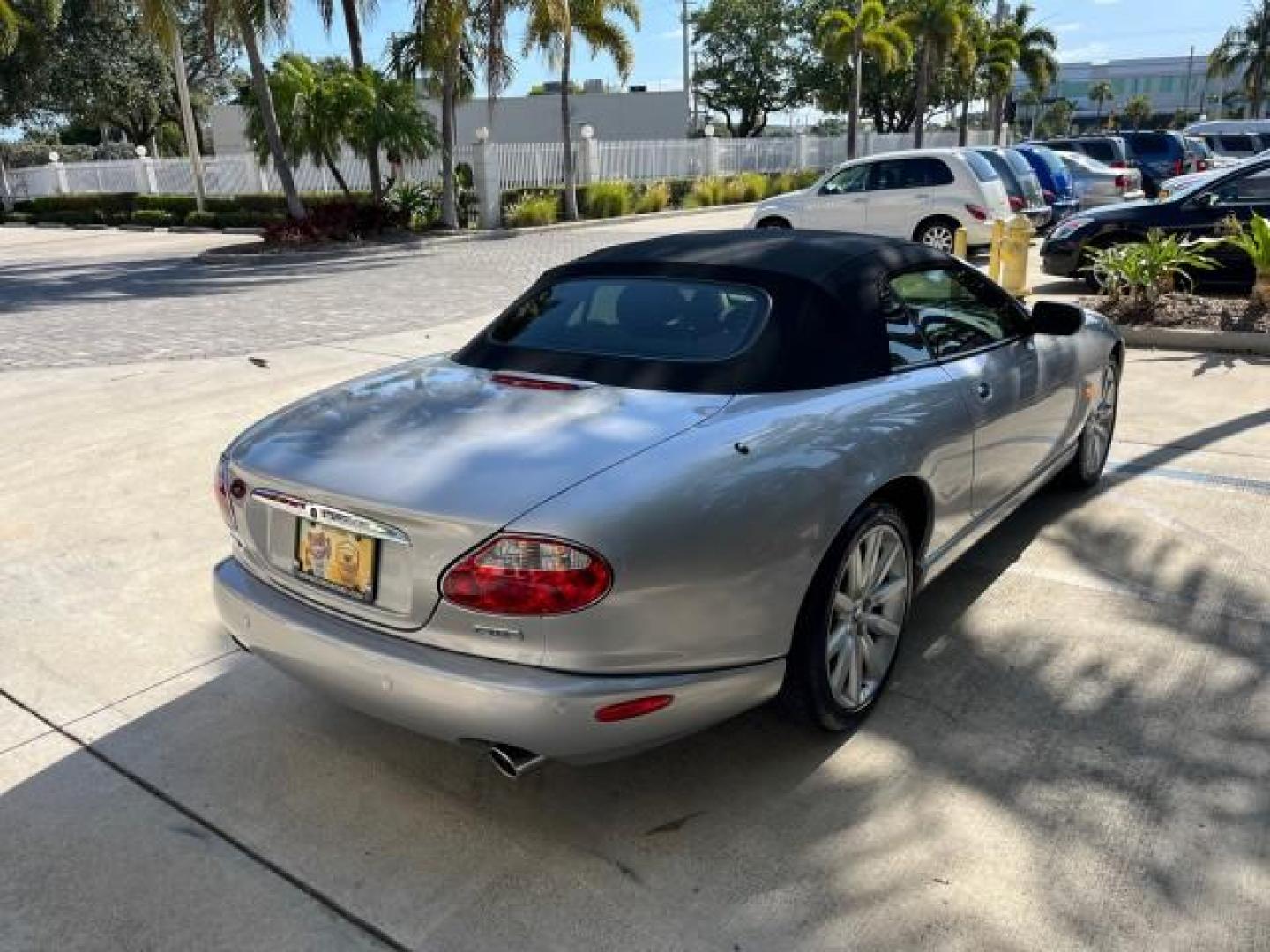 2005 Platinum /Charcoal Jaguar XK8 CONV LOW MILES 22,262 (SAJDA42C852) with an 4.2L DOHC EFI 32-Valve Aluminum Alloy V8 Engine engine, Automatic transmission, located at 4701 North Dixie Hwy, Pompano Beach, FL, 33064, (954) 422-2889, 26.240938, -80.123474 - 2005 JAGUAR XK-SERIES XK8 NEW $76,030 ROAD READY VIN: SAJDA42C852A44308 NO RECALLS 4.2L V8 CONVERTIBLE FLORIDA OWNER 4.2L V8 F DOHC POWER CONVERTIBLE TOP GASOLINE 9 SERVICE RECORDS POWER LEATHER SEATS REAR WHEEL DRIVE SUPER LOW MILES 22,262 PARKING SENSORS Alloy Wheels Anti-Theft System Auto-dimming - Photo#7