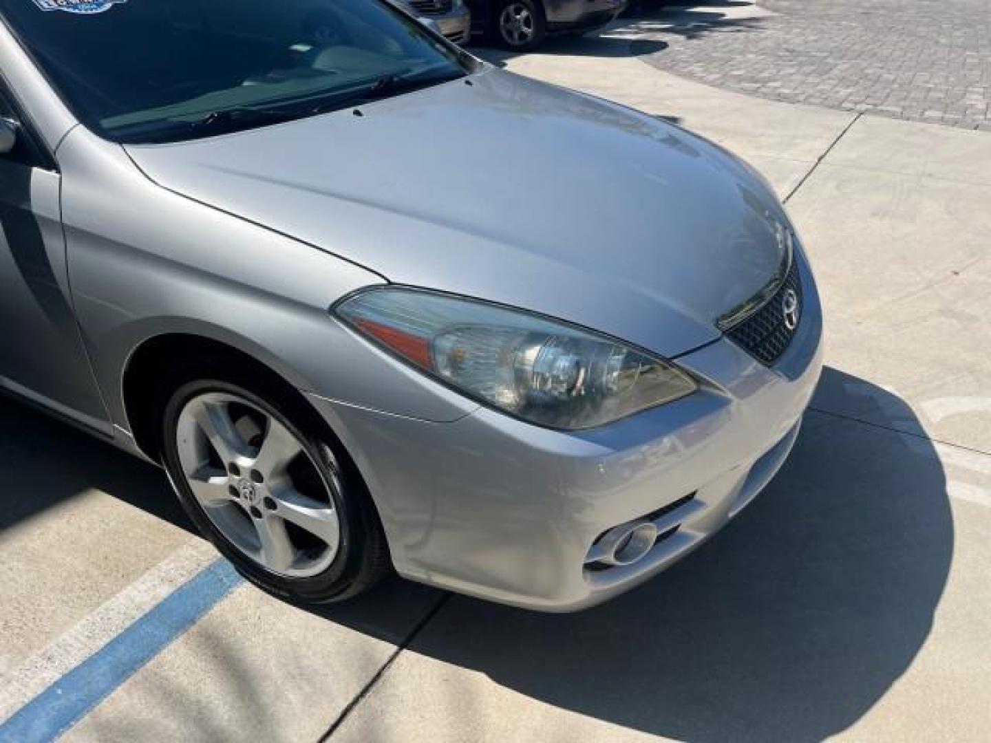 2007 Titanium Metallic /Dark Gray Toyota Camry Solara 1 FL SLE LOW MILES 76,369 (4T1FA38P17U) with an 3.3L DOHC SMPI VVT-i 24-Valve V6 Engine engine, Automatic transmission, located at 4701 North Dixie Hwy, Pompano Beach, FL, 33064, (954) 422-2889, 26.240938, -80.123474 - 2007 TOYOTA CAMRY SOLARA SE V6 ROAD READY 3.3L V6 VIN: 4T1FA38P17U129146 NO RECALLS 29 MPG CONVERTIBLE 1 OWNER FLORIDA 3.3L V6 F DOHC 24V LOW MILES 76,369 SLE GASOLINE POWER CONVERTIBLE TOP FRONT WHEEL DRIVE POWER LEATHER SEATS Adjustable Lumbar Support Anti-Theft System Cruise Control Electronic Br - Photo#60