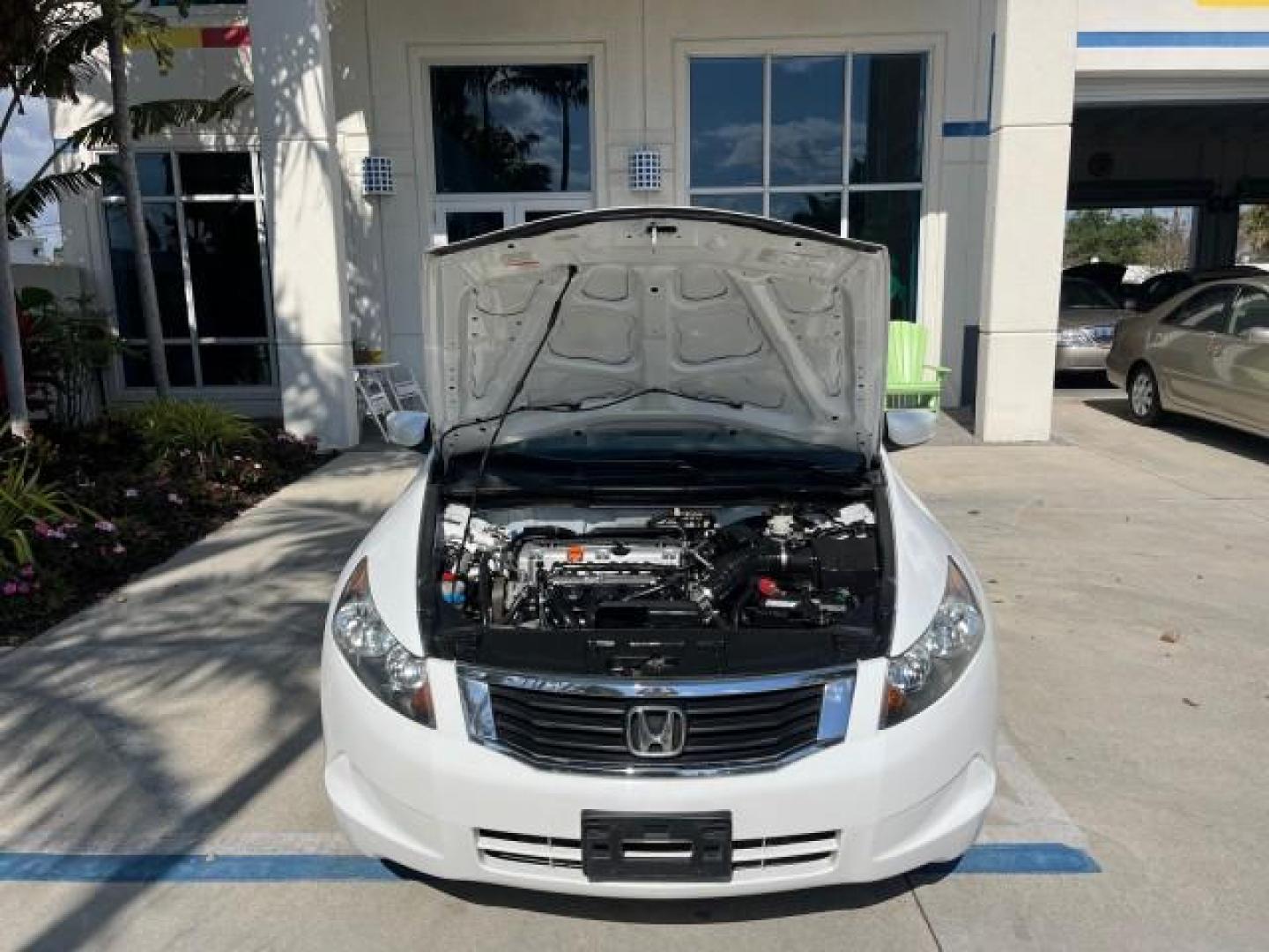 2008 Taffeta White /Ivory Honda Accord Sdn LX LOW MILES 59,410 (1HGCP26378A) with an 2.4L DOHC MPFI 16-Valve i-VTEC I4 Engine engine, Automatic transmission, located at 4701 North Dixie Hwy, Pompano Beach, FL, 33064, (954) 422-2889, 26.240938, -80.123474 - OUR WEBPAGE FLORIDACARS1.COM HAS OVER 100 PHOTOS AND FREE CARFAX LINK 2008 HONDA ACCORD LX ROAD READY 2.4L I4 VIN: 1HGCP26378A018220 NO ACCIDENTS 31 MPG SEDAN 4 DR NO RECALLS 2.4L I4 F DOHC 16V LOW MILES 59,410 GASOLINE FLORIDA OWNER FRONT WHEEL DRIVE 10 SERVICE RECORDS Active Head Restraints Anti-T - Photo#63