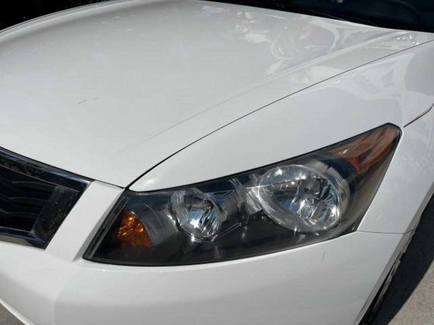 2008 Taffeta White /Ivory Honda Accord Sdn LX LOW MILES 59,410 (1HGCP26378A) with an 2.4L DOHC MPFI 16-Valve i-VTEC I4 Engine engine, Automatic transmission, located at 4701 North Dixie Hwy, Pompano Beach, FL, 33064, (954) 422-2889, 26.240938, -80.123474 - OUR WEBPAGE FLORIDACARS1.COM HAS OVER 100 PHOTOS AND FREE CARFAX LINK 2008 HONDA ACCORD LX ROAD READY 2.4L I4 VIN: 1HGCP26378A018220 NO ACCIDENTS 31 MPG SEDAN 4 DR NO RECALLS 2.4L I4 F DOHC 16V LOW MILES 59,410 GASOLINE FLORIDA OWNER FRONT WHEEL DRIVE 10 SERVICE RECORDS Active Head Restraints Anti-T - Photo#70