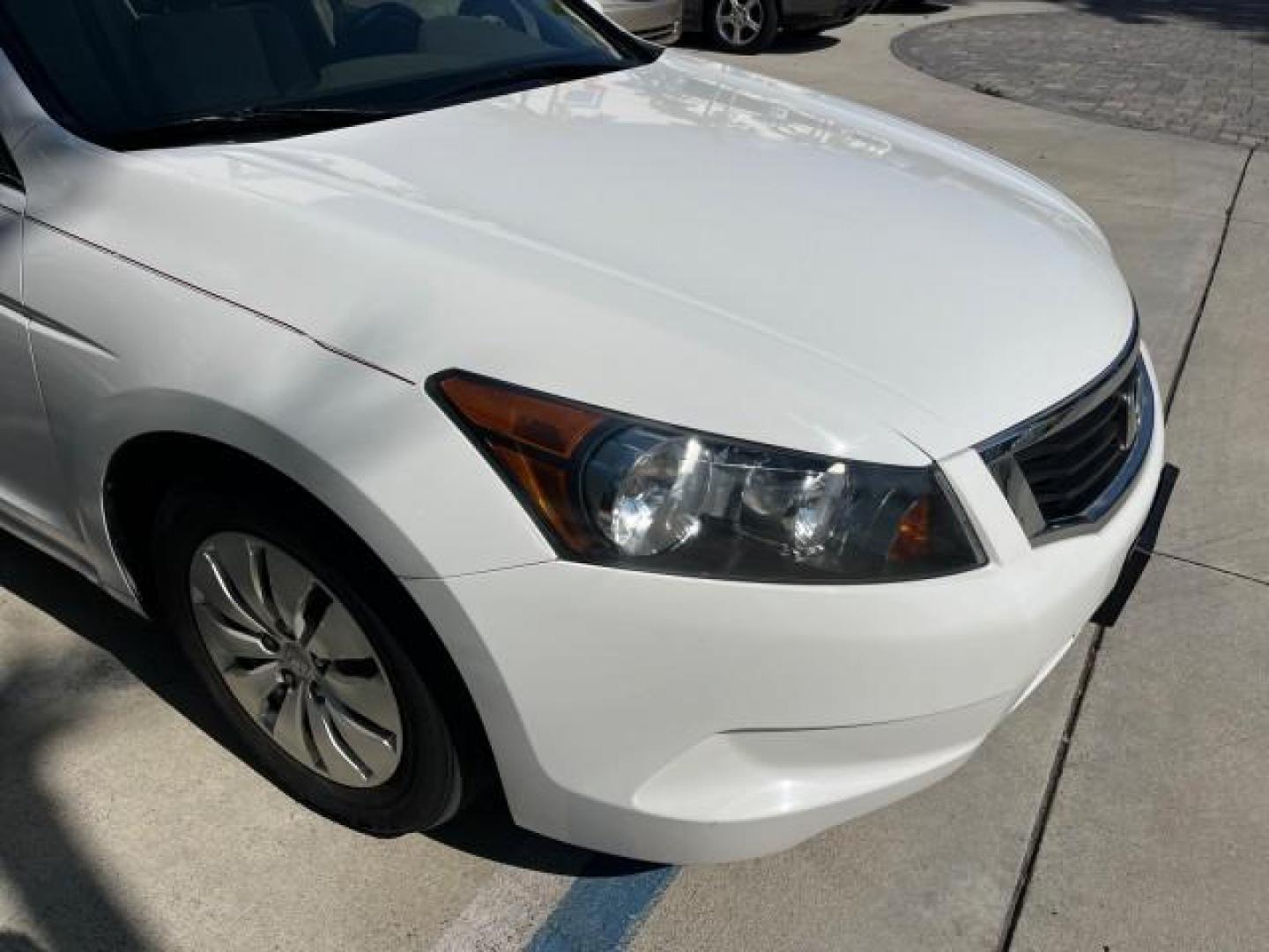 2008 Taffeta White /Ivory Honda Accord Sdn LX LOW MILES 59,410 (1HGCP26378A) with an 2.4L DOHC MPFI 16-Valve i-VTEC I4 Engine engine, Automatic transmission, located at 4701 North Dixie Hwy, Pompano Beach, FL, 33064, (954) 422-2889, 26.240938, -80.123474 - OUR WEBPAGE FLORIDACARS1.COM HAS OVER 100 PHOTOS AND FREE CARFAX LINK 2008 HONDA ACCORD LX ROAD READY 2.4L I4 VIN: 1HGCP26378A018220 NO ACCIDENTS 31 MPG SEDAN 4 DR NO RECALLS 2.4L I4 F DOHC 16V LOW MILES 59,410 GASOLINE FLORIDA OWNER FRONT WHEEL DRIVE 10 SERVICE RECORDS Active Head Restraints Anti-T - Photo#74