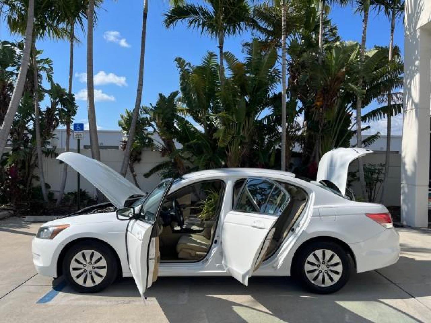 2008 Taffeta White /Ivory Honda Accord Sdn LX LOW MILES 59,410 (1HGCP26378A) with an 2.4L DOHC MPFI 16-Valve i-VTEC I4 Engine engine, Automatic transmission, located at 4701 North Dixie Hwy, Pompano Beach, FL, 33064, (954) 422-2889, 26.240938, -80.123474 - OUR WEBPAGE FLORIDACARS1.COM HAS OVER 100 PHOTOS AND FREE CARFAX LINK 2008 HONDA ACCORD LX ROAD READY 2.4L I4 VIN: 1HGCP26378A018220 NO ACCIDENTS 31 MPG SEDAN 4 DR NO RECALLS 2.4L I4 F DOHC 16V LOW MILES 59,410 GASOLINE FLORIDA OWNER FRONT WHEEL DRIVE 10 SERVICE RECORDS Active Head Restraints Anti-T - Photo#8