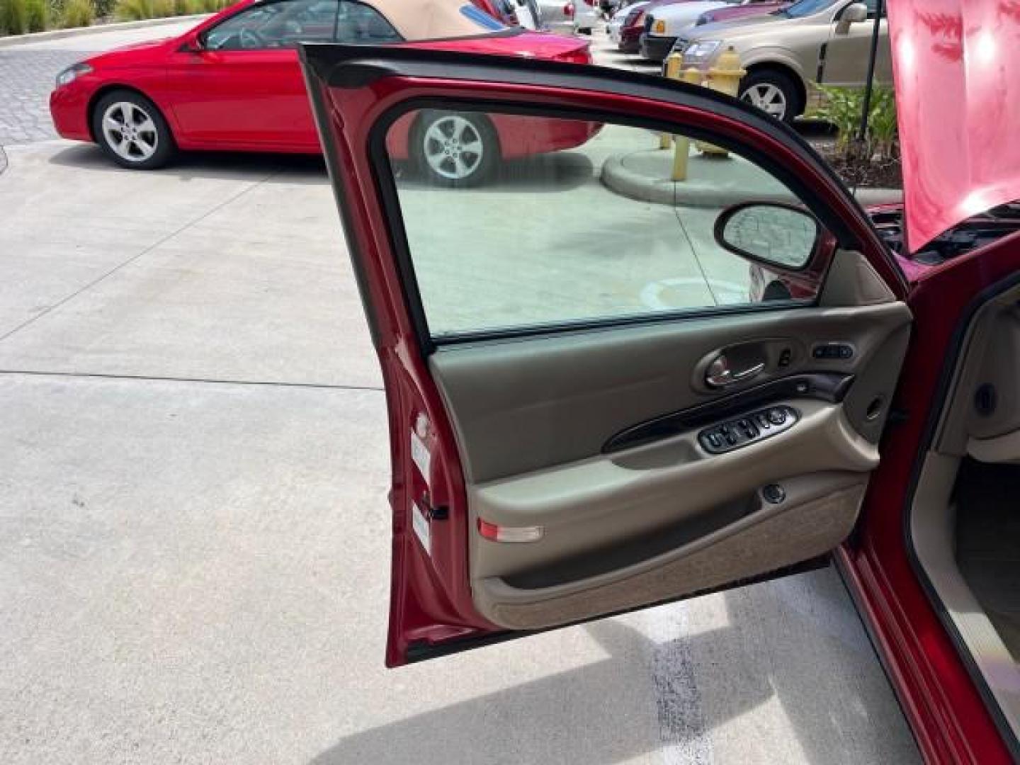 2003 Cabernet Red Metallic /Taupe Buick LeSabre Limited LOW MILES 30,061 (1G4HR54KX3U) with an 3.8L 3800 V6 SFI Engine engine, Automatic transmission, located at 4701 North Dixie Hwy, Pompano Beach, FL, 33064, (954) 422-2889, 26.240938, -80.123474 - 2003 BUICK LESABRE LIMITED NEW $33,995 ROAD READY VIN: 1G4HR54KX3U226444 NO ACCIDENTS NO RECALLS SEDAN 4 DR LIMITED 3.8L V6 29 MPG 3.8L V6 F 12V DUAL AC HUD LEATHER SEATS GASOLINE HEATED SEATS/MIRRORS FLORIDA OWNER FRONT WHEEL DRIVE 9 SERVIDCE RECORDS LOW MILES 30,061 Air Suspension Alloy Wheels Ant - Photo#9