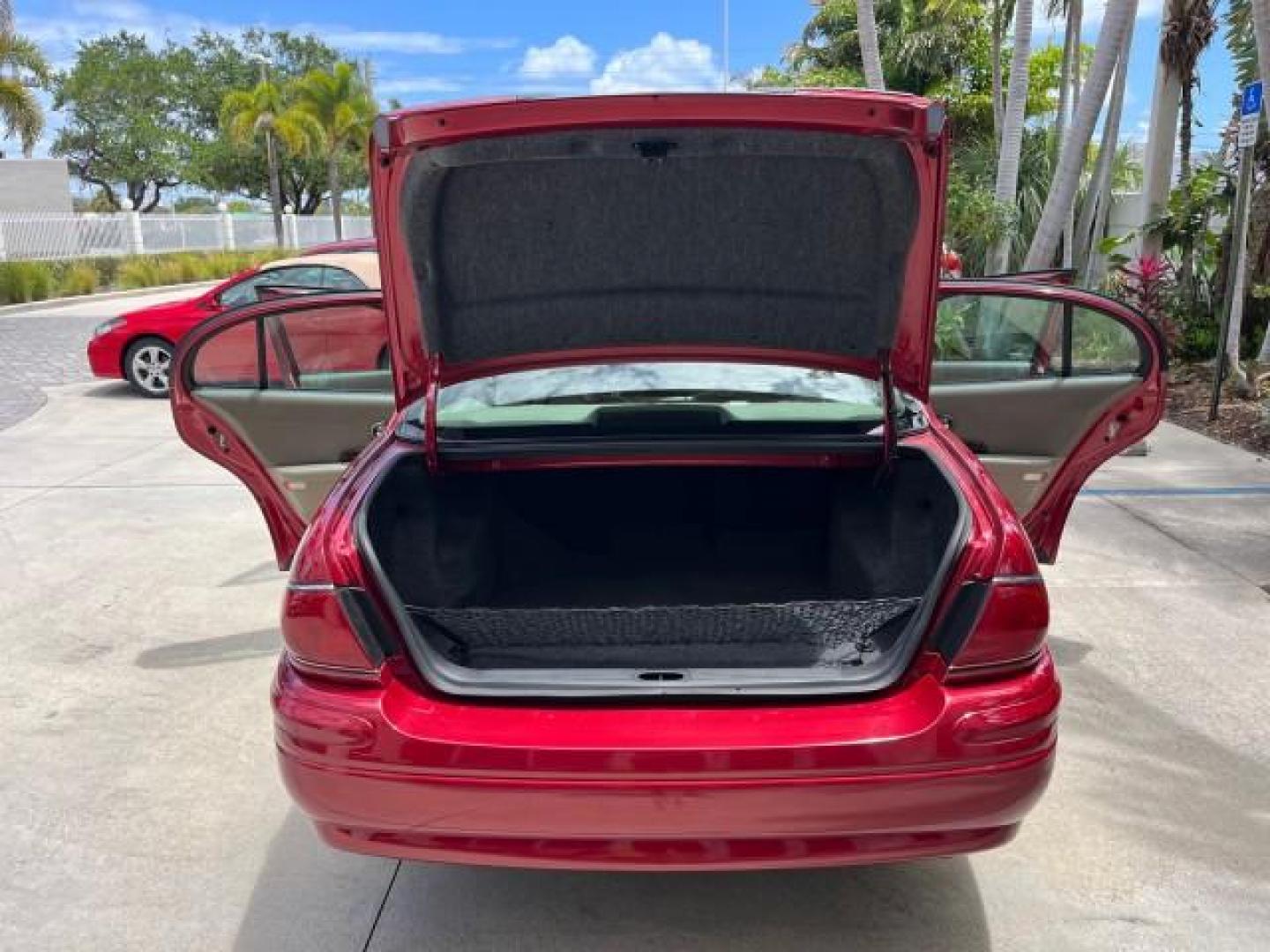 2003 Cabernet Red Metallic /Taupe Buick LeSabre Limited LOW MILES 30,061 (1G4HR54KX3U) with an 3.8L 3800 V6 SFI Engine engine, Automatic transmission, located at 4701 North Dixie Hwy, Pompano Beach, FL, 33064, (954) 422-2889, 26.240938, -80.123474 - 2003 BUICK LESABRE LIMITED NEW $33,995 ROAD READY VIN: 1G4HR54KX3U226444 NO ACCIDENTS NO RECALLS SEDAN 4 DR LIMITED 3.8L V6 29 MPG 3.8L V6 F 12V DUAL AC HUD LEATHER SEATS GASOLINE HEATED SEATS/MIRRORS FLORIDA OWNER FRONT WHEEL DRIVE 9 SERVIDCE RECORDS LOW MILES 30,061 Air Suspension Alloy Wheels Ant - Photo#15