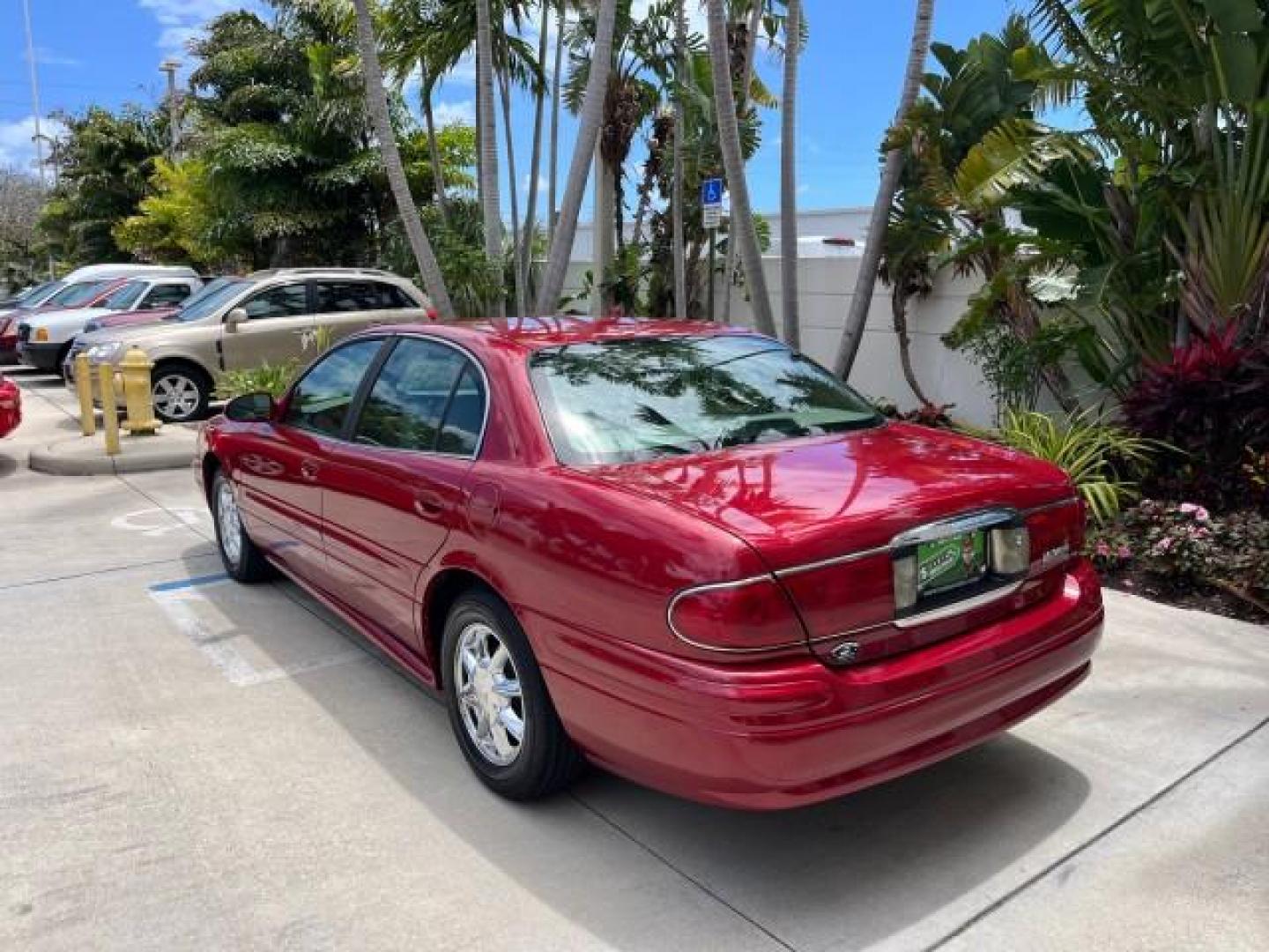 2003 Cabernet Red Metallic /Taupe Buick LeSabre Limited LOW MILES 30,061 (1G4HR54KX3U) with an 3.8L 3800 V6 SFI Engine engine, Automatic transmission, located at 4701 North Dixie Hwy, Pompano Beach, FL, 33064, (954) 422-2889, 26.240938, -80.123474 - 2003 BUICK LESABRE LIMITED NEW $33,995 ROAD READY VIN: 1G4HR54KX3U226444 NO ACCIDENTS NO RECALLS SEDAN 4 DR LIMITED 3.8L V6 29 MPG 3.8L V6 F 12V DUAL AC HUD LEATHER SEATS GASOLINE HEATED SEATS/MIRRORS FLORIDA OWNER FRONT WHEEL DRIVE 9 SERVIDCE RECORDS LOW MILES 30,061 Air Suspension Alloy Wheels Ant - Photo#5