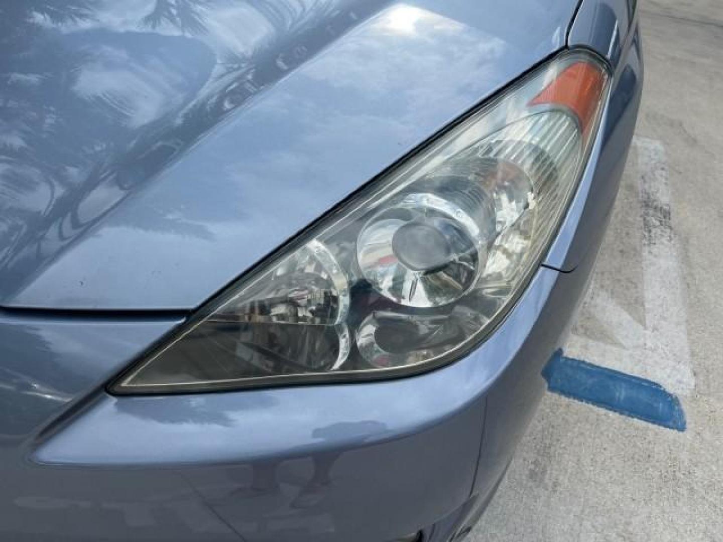 2005 Cosmic Blue Metallic /Ivory Toyota Camry Solara LOW MILES 69,408 SLE (4T1FA38P85U) with an 3.3L DOHC SEFI VVT-i 24-Valve V6 Engine engine, Automatic transmission, located at 4701 North Dixie Hwy, Pompano Beach, FL, 33064, (954) 422-2889, 26.240938, -80.123474 - 2005 TOYOTA CAMRY SOLARA SE V6 ROAD READY 3.3L V6 VIN: 4T1FA38P85U054152 POWER CONVERTIBLE TOP CONVERTIBLE POWER LEATHER SEATS 3.3L V6 F DOHC 24V 29 SERVICE RECORDS GASOLINE FLORIDA OWNER 31 MPG FRONT WHEEL DRIVE LOW MILES 69,408 NO ACCIDENTS NO RECALLS Alloy Wheels Automatic Climate Control Cruise - Photo#56