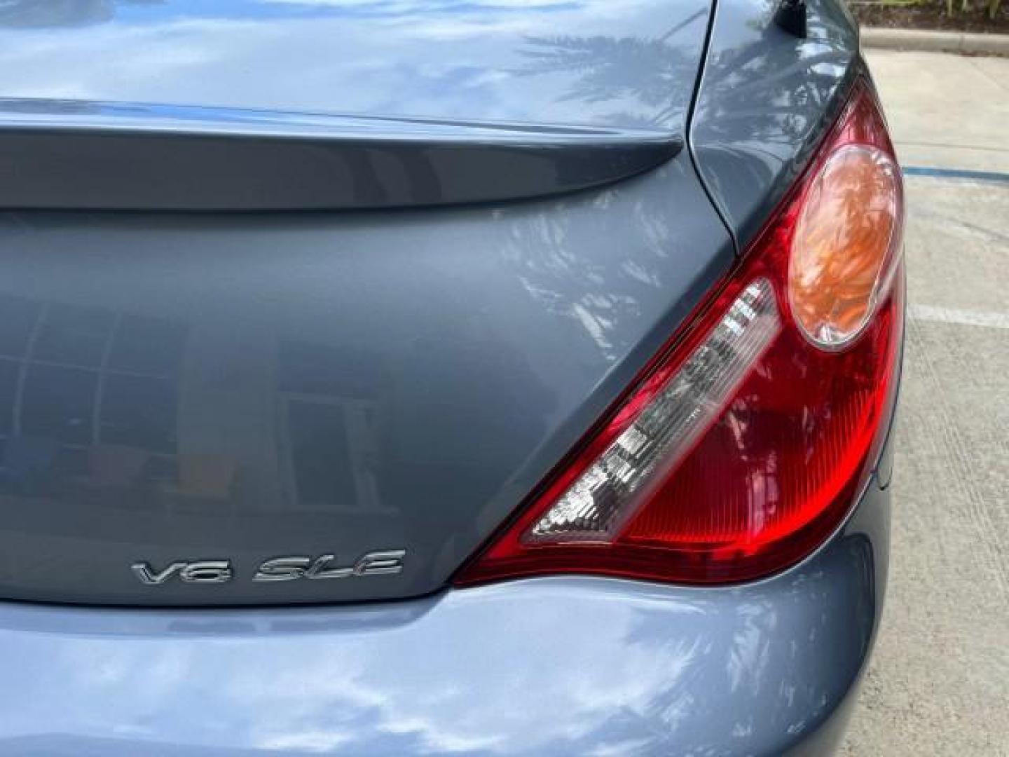 2005 Cosmic Blue Metallic /Ivory Toyota Camry Solara LOW MILES 69,408 SLE (4T1FA38P85U) with an 3.3L DOHC SEFI VVT-i 24-Valve V6 Engine engine, Automatic transmission, located at 4701 North Dixie Hwy, Pompano Beach, FL, 33064, (954) 422-2889, 26.240938, -80.123474 - 2005 TOYOTA CAMRY SOLARA SE V6 ROAD READY 3.3L V6 VIN: 4T1FA38P85U054152 POWER CONVERTIBLE TOP CONVERTIBLE POWER LEATHER SEATS 3.3L V6 F DOHC 24V 29 SERVICE RECORDS GASOLINE FLORIDA OWNER 31 MPG FRONT WHEEL DRIVE LOW MILES 69,408 NO ACCIDENTS NO RECALLS Alloy Wheels Automatic Climate Control Cruise - Photo#79