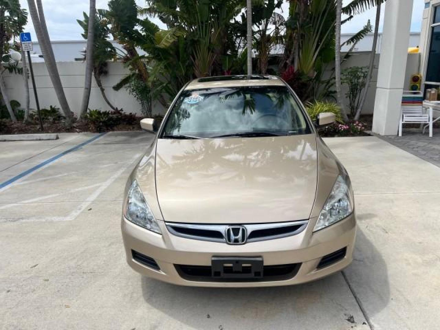 2007 Desert Mist Metallic /Ivory Honda Accord Sdn 1 FL EX-L LOW MILES 67,118 (1HGCM56837A) with an 2.4L DOHC MPFI 16-Valve i-VTEC I4 Engine engine, Automatic transmission, located at 4701 North Dixie Hwy, Pompano Beach, FL, 33064, (954) 422-2889, 26.240938, -80.123474 - 2007 HONDA ACCORD EX-L ROAD READY 2.4L I4 VIN: 1HGCM56837A115841 NO ACCIDENTS NO RECALLS SEDAN 4 DR LOW MILES 67,118 34 MPG 2.4L I4 F DOHC 16V HEATED SEATS/MIRRORS 1 OWNER FLORIDA GASOLINE DUAL ZONE AC POWER LEATHER SEATS FRONT WHEEL DRIVE POWER SUNROOF 11 SERVICE RECORDS Alloy Wheels Anti-Theft Sys - Photo#2