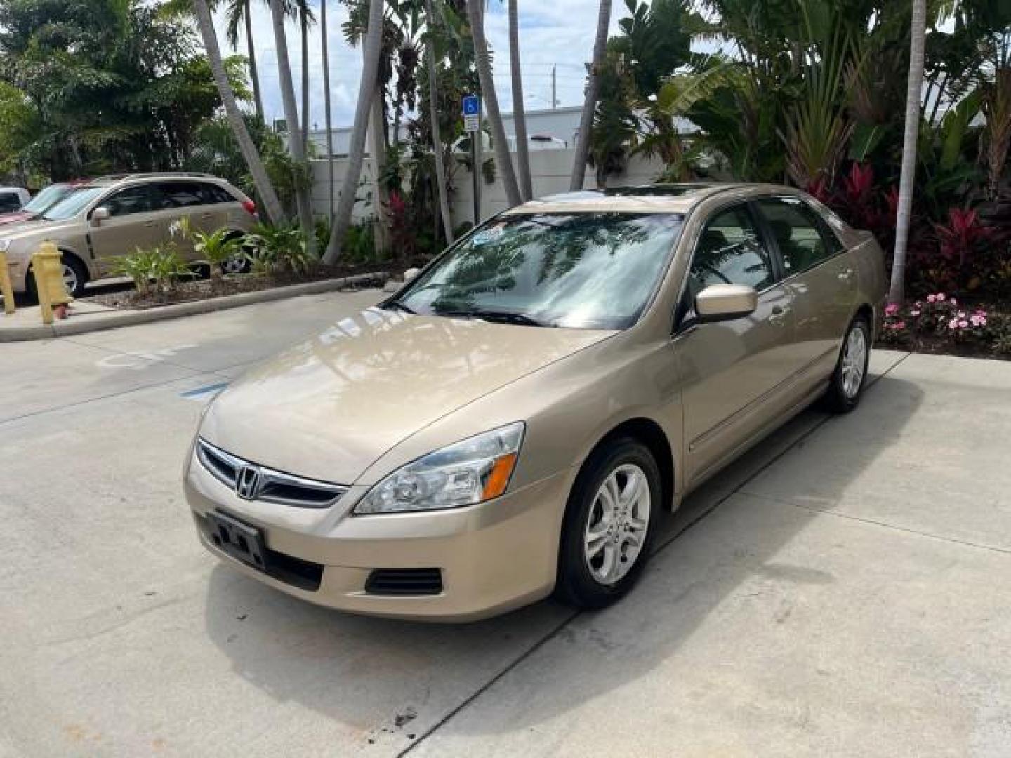 2007 Desert Mist Metallic /Ivory Honda Accord Sdn 1 FL EX-L LOW MILES 67,118 (1HGCM56837A) with an 2.4L DOHC MPFI 16-Valve i-VTEC I4 Engine engine, Automatic transmission, located at 4701 North Dixie Hwy, Pompano Beach, FL, 33064, (954) 422-2889, 26.240938, -80.123474 - 2007 HONDA ACCORD EX-L ROAD READY 2.4L I4 VIN: 1HGCM56837A115841 NO ACCIDENTS NO RECALLS SEDAN 4 DR LOW MILES 67,118 34 MPG 2.4L I4 F DOHC 16V HEATED SEATS/MIRRORS 1 OWNER FLORIDA GASOLINE DUAL ZONE AC POWER LEATHER SEATS FRONT WHEEL DRIVE POWER SUNROOF 11 SERVICE RECORDS Alloy Wheels Anti-Theft Sys - Photo#3