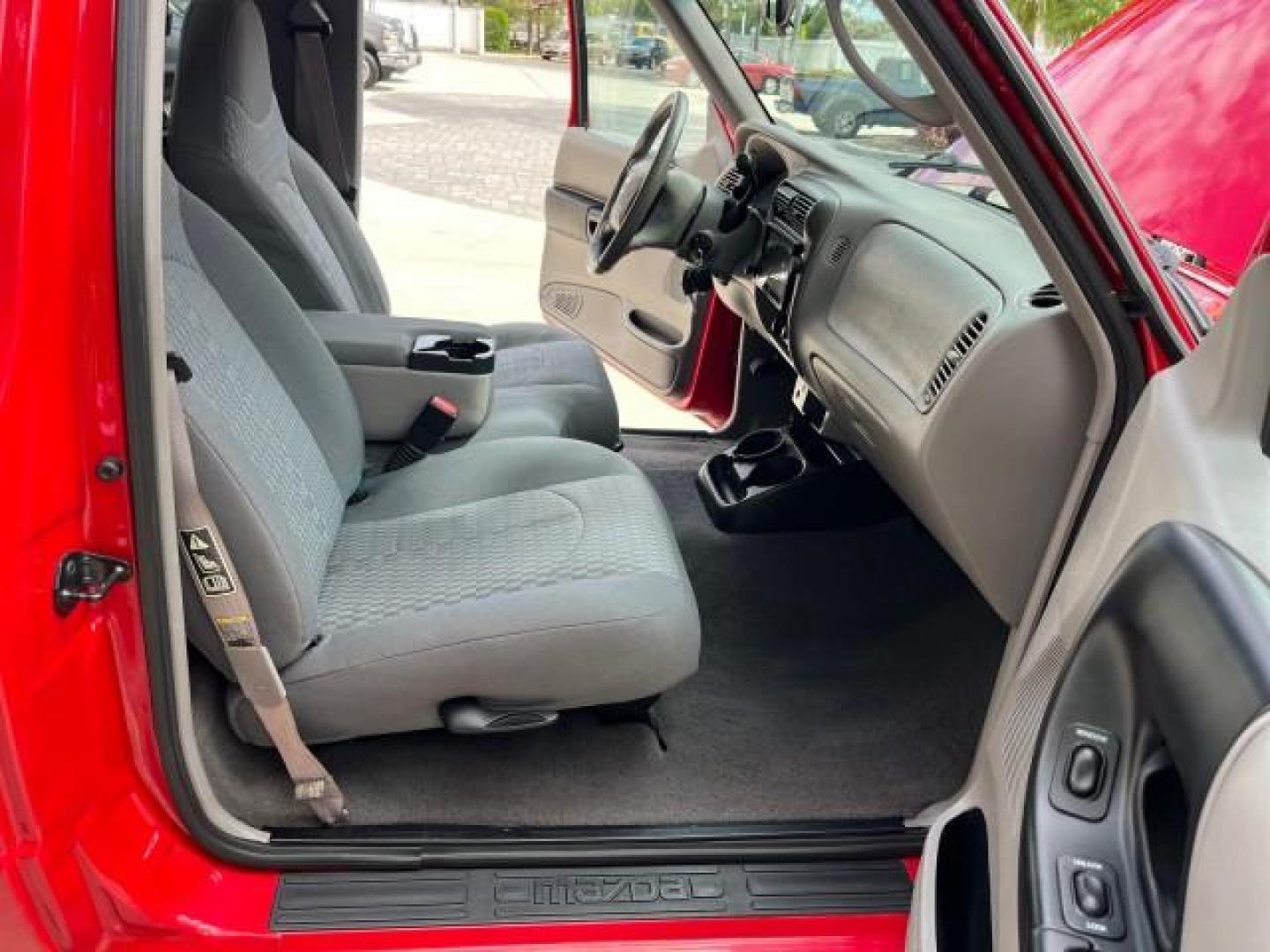 2002 Performance Red Metallic /Medium Graphite Mazda B-Series 2WD Truck DS LOW MILES 80,576 (4F4YR12U02T) with an 3.0L MFI V6 Engine engine, Automatic transmission, located at 4701 North Dixie Hwy, Pompano Beach, FL, 33064, (954) 422-2889, 26.240938, -80.123474 - 2002 MAZDA B-SERIES B3000 DUAL SPORT AUTO ROAD READY WORK READY VIN: 4F4YR12U02TM07288 NO ACCIDENTS PICKUP NO RECALLS 3.0L V6 F LOW MILES 80,576 GASOLINE POWER MIRRORS 35 SERVICE RECORDS REAR WHEEL DRIVE BACK UP CAMERA 6 FT BED 3.0L V6 6.0' Bed Length Alloy Wheels Anti-Theft System Fog Lights RWD Re - Photo#13