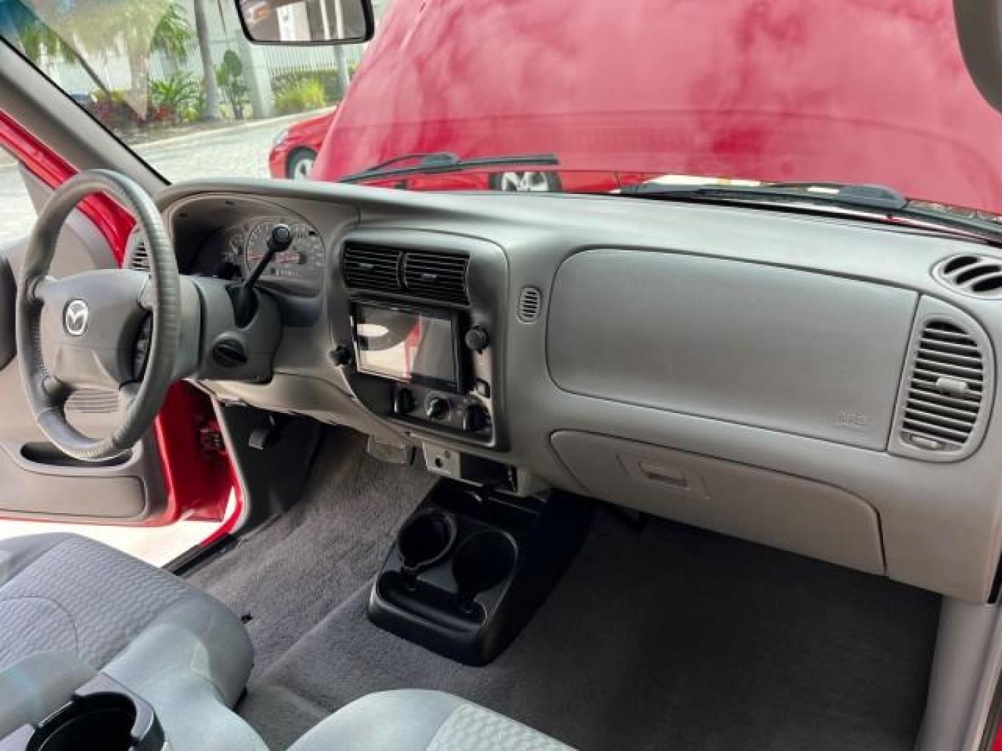 2002 Performance Red Metallic /Medium Graphite Mazda B-Series 2WD Truck DS LOW MILES 80,576 (4F4YR12U02T) with an 3.0L MFI V6 Engine engine, Automatic transmission, located at 4701 North Dixie Hwy, Pompano Beach, FL, 33064, (954) 422-2889, 26.240938, -80.123474 - 2002 MAZDA B-SERIES B3000 DUAL SPORT AUTO ROAD READY WORK READY VIN: 4F4YR12U02TM07288 NO ACCIDENTS PICKUP NO RECALLS 3.0L V6 F LOW MILES 80,576 GASOLINE POWER MIRRORS 35 SERVICE RECORDS REAR WHEEL DRIVE BACK UP CAMERA 6 FT BED 3.0L V6 6.0' Bed Length Alloy Wheels Anti-Theft System Fog Lights RWD Re - Photo#29