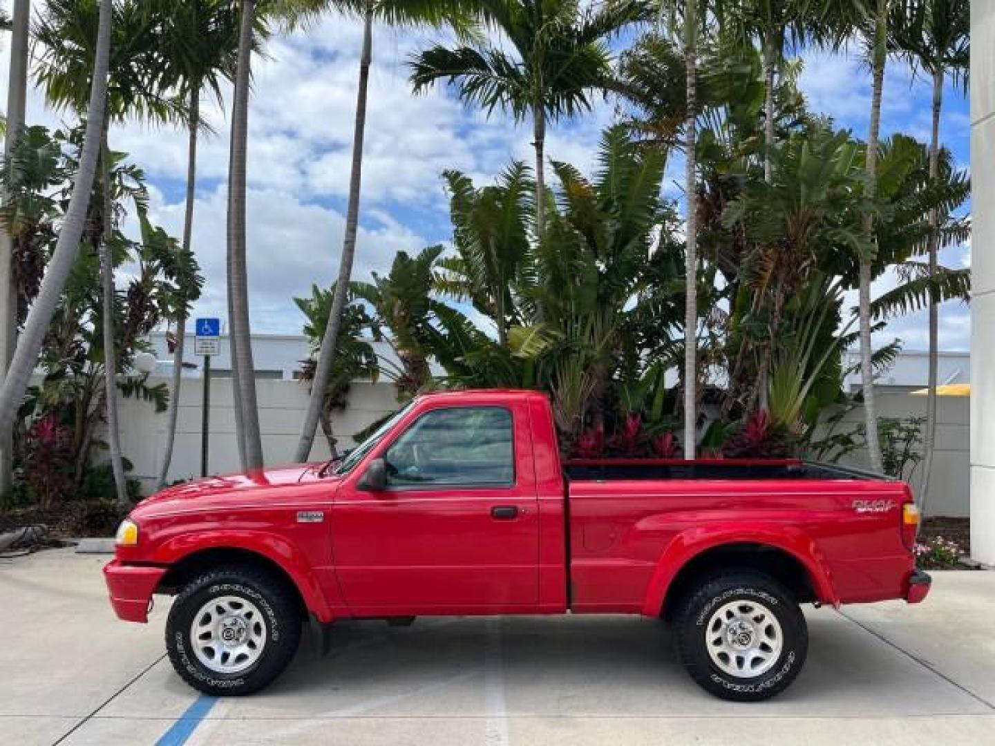 2002 Performance Red Metallic /Medium Graphite Mazda B-Series 2WD Truck DS LOW MILES 80,576 (4F4YR12U02T) with an 3.0L MFI V6 Engine engine, Automatic transmission, located at 4701 North Dixie Hwy, Pompano Beach, FL, 33064, (954) 422-2889, 26.240938, -80.123474 - 2002 MAZDA B-SERIES B3000 DUAL SPORT AUTO ROAD READY WORK READY VIN: 4F4YR12U02TM07288 NO ACCIDENTS PICKUP NO RECALLS 3.0L V6 F LOW MILES 80,576 GASOLINE POWER MIRRORS 35 SERVICE RECORDS REAR WHEEL DRIVE BACK UP CAMERA 6 FT BED 3.0L V6 6.0' Bed Length Alloy Wheels Anti-Theft System Fog Lights RWD Re - Photo#4