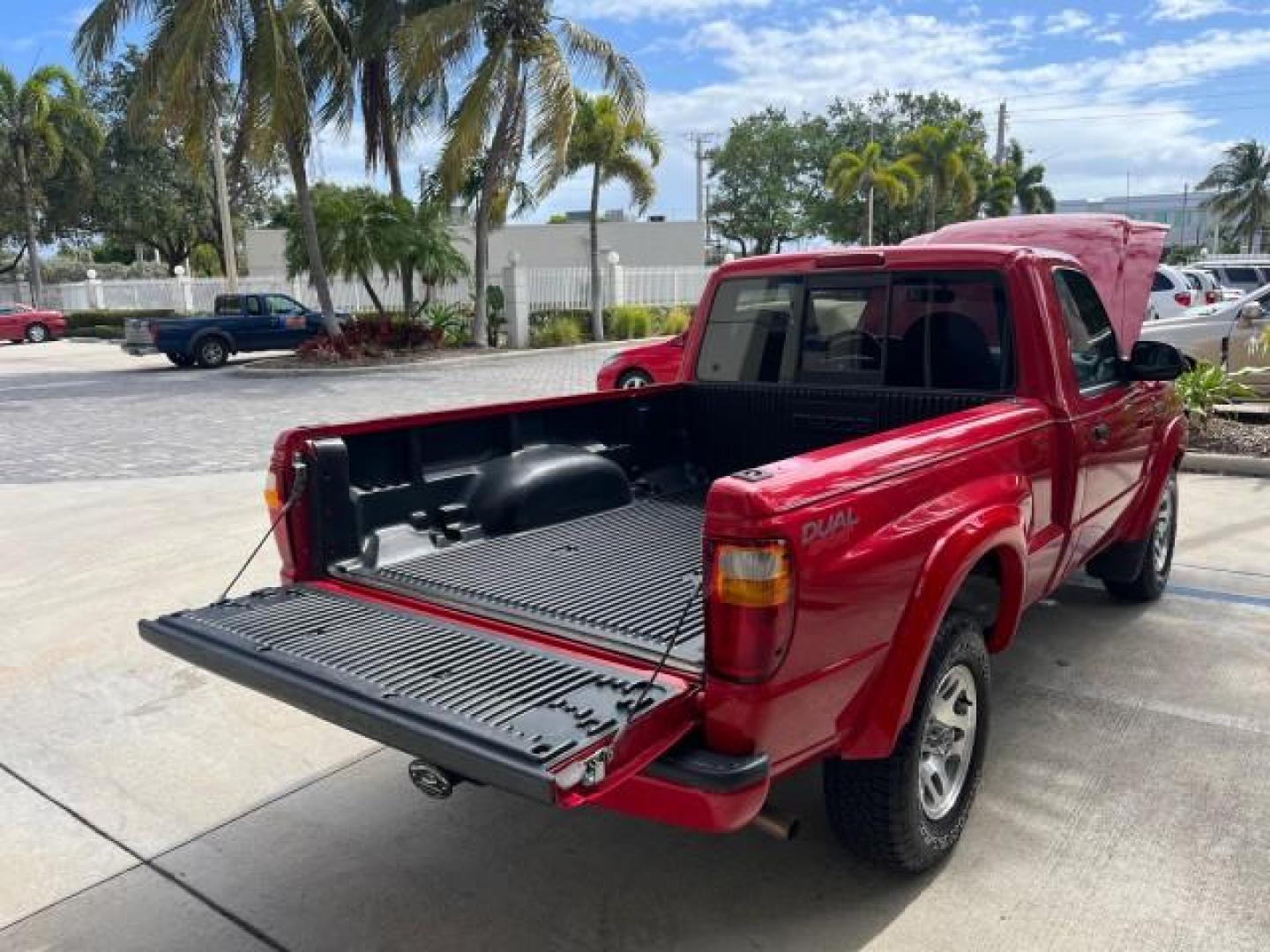 2002 Performance Red Metallic /Medium Graphite Mazda B-Series 2WD Truck DS LOW MILES 80,576 (4F4YR12U02T) with an 3.0L MFI V6 Engine engine, Automatic transmission, located at 4701 North Dixie Hwy, Pompano Beach, FL, 33064, (954) 422-2889, 26.240938, -80.123474 - 2002 MAZDA B-SERIES B3000 DUAL SPORT AUTO ROAD READY WORK READY VIN: 4F4YR12U02TM07288 NO ACCIDENTS PICKUP NO RECALLS 3.0L V6 F LOW MILES 80,576 GASOLINE POWER MIRRORS 35 SERVICE RECORDS REAR WHEEL DRIVE BACK UP CAMERA 6 FT BED 3.0L V6 6.0' Bed Length Alloy Wheels Anti-Theft System Fog Lights RWD Re - Photo#56