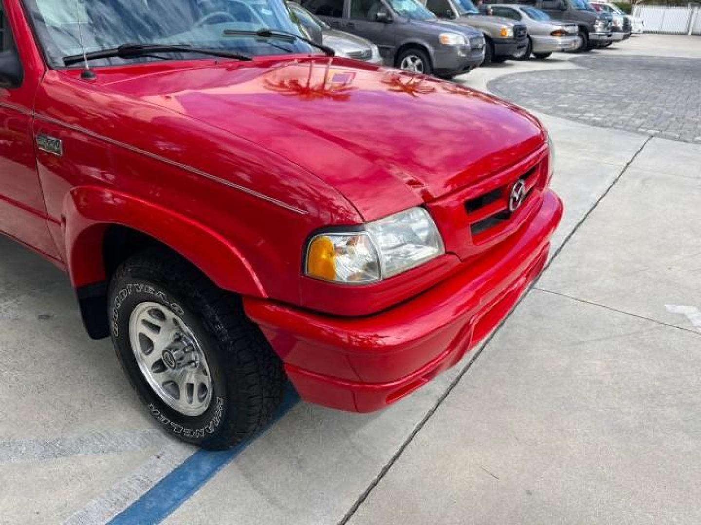 2002 Performance Red Metallic /Medium Graphite Mazda B-Series 2WD Truck DS LOW MILES 80,576 (4F4YR12U02T) with an 3.0L MFI V6 Engine engine, Automatic transmission, located at 4701 North Dixie Hwy, Pompano Beach, FL, 33064, (954) 422-2889, 26.240938, -80.123474 - 2002 MAZDA B-SERIES B3000 DUAL SPORT AUTO ROAD READY WORK READY VIN: 4F4YR12U02TM07288 NO ACCIDENTS PICKUP NO RECALLS 3.0L V6 F LOW MILES 80,576 GASOLINE POWER MIRRORS 35 SERVICE RECORDS REAR WHEEL DRIVE BACK UP CAMERA 6 FT BED 3.0L V6 6.0' Bed Length Alloy Wheels Anti-Theft System Fog Lights RWD Re - Photo#71