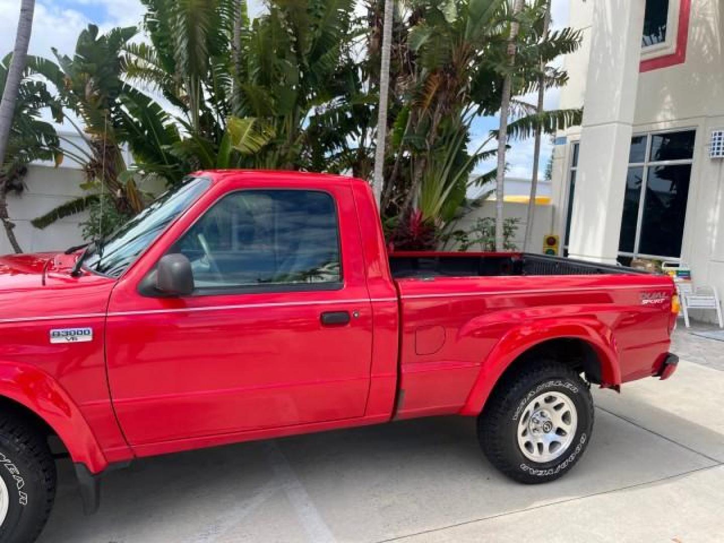 2002 Performance Red Metallic /Medium Graphite Mazda B-Series 2WD Truck DS LOW MILES 80,576 (4F4YR12U02T) with an 3.0L MFI V6 Engine engine, Automatic transmission, located at 4701 North Dixie Hwy, Pompano Beach, FL, 33064, (954) 422-2889, 26.240938, -80.123474 - 2002 MAZDA B-SERIES B3000 DUAL SPORT AUTO ROAD READY WORK READY VIN: 4F4YR12U02TM07288 NO ACCIDENTS PICKUP NO RECALLS 3.0L V6 F LOW MILES 80,576 GASOLINE POWER MIRRORS 35 SERVICE RECORDS REAR WHEEL DRIVE BACK UP CAMERA 6 FT BED 3.0L V6 6.0' Bed Length Alloy Wheels Anti-Theft System Fog Lights RWD Re - Photo#76