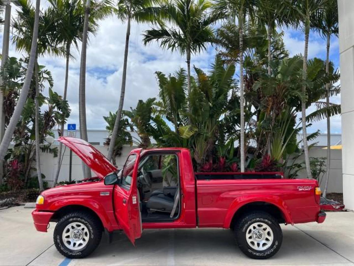 2002 Performance Red Metallic /Medium Graphite Mazda B-Series 2WD Truck DS LOW MILES 80,576 (4F4YR12U02T) with an 3.0L MFI V6 Engine engine, Automatic transmission, located at 4701 North Dixie Hwy, Pompano Beach, FL, 33064, (954) 422-2889, 26.240938, -80.123474 - 2002 MAZDA B-SERIES B3000 DUAL SPORT AUTO ROAD READY WORK READY VIN: 4F4YR12U02TM07288 NO ACCIDENTS PICKUP NO RECALLS 3.0L V6 F LOW MILES 80,576 GASOLINE POWER MIRRORS 35 SERVICE RECORDS REAR WHEEL DRIVE BACK UP CAMERA 6 FT BED 3.0L V6 6.0' Bed Length Alloy Wheels Anti-Theft System Fog Lights RWD Re - Photo#8