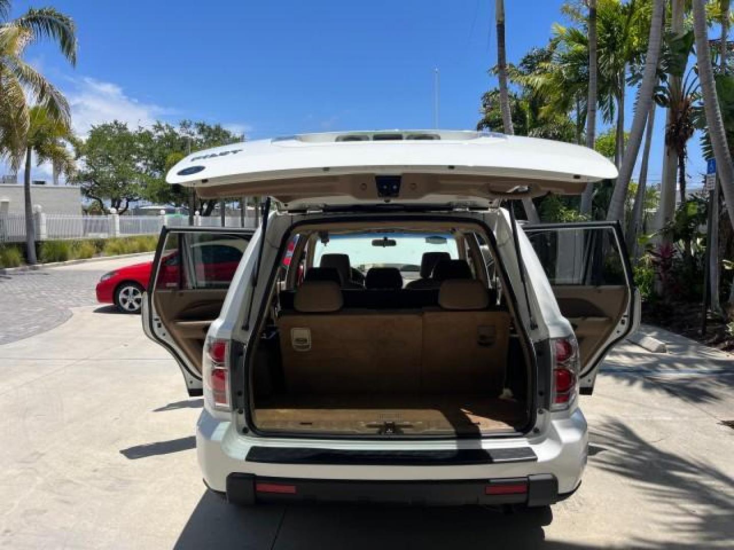 2007 Taffeta White /Saddle Honda Pilot EX LOW MILES 65,235 (5FNYF28417B) with an 3.5L SOHC MPFI 24-Valve i-VTEC V6 Engine engine, Automatic transmission, located at 4701 North Dixie Hwy, Pompano Beach, FL, 33064, (954) 422-2889, 26.240938, -80.123474 - OUR WEBPAGE FLORIDACARS1.COM HAS OVER 100 PHOTOS AND FREE CARFAX LINK 2007 HONDA PILOT EX ROAD READY 3.5L V6 VIN: 5FNYF28417B023674 NO ACCIDENTS 4 DOOR WAGON/SPORT UTILITY NO RECALLS 3.5L V6 F SOHC LOW MILES 65,235 GASOLINE POWER SEARS/MIRRORS 8 SERVICE RECORDS FRONT WHEEL DRIVE FLORIDA OWNER 3 ROW - Photo#15