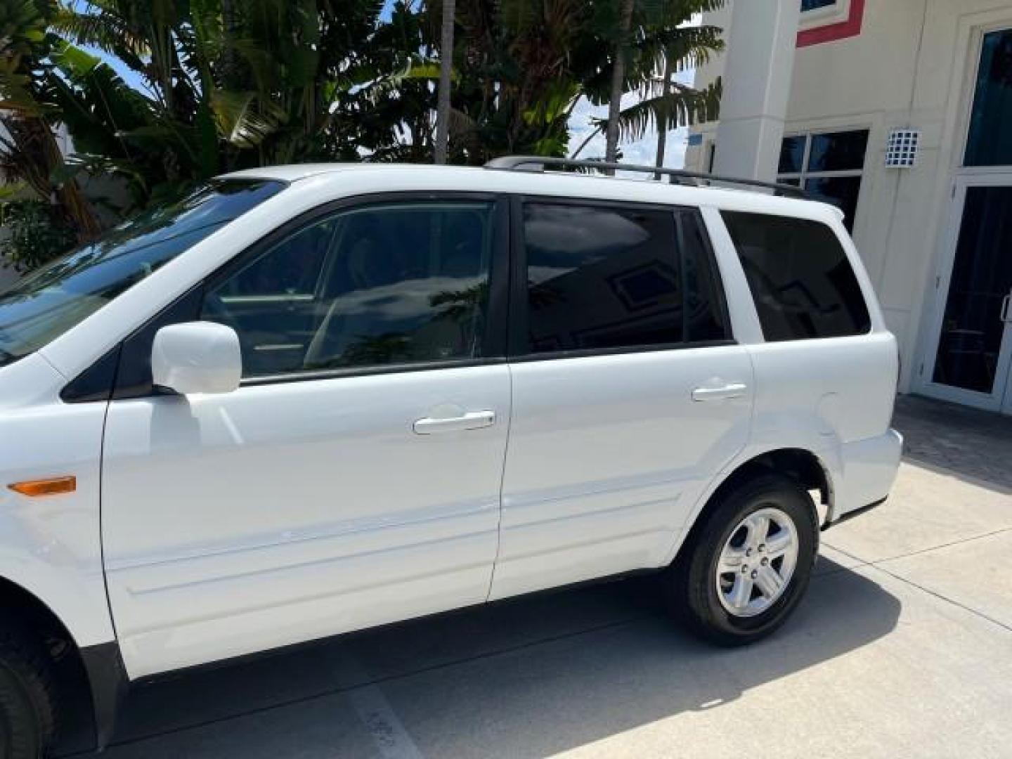 2007 Taffeta White /Saddle Honda Pilot EX LOW MILES 65,235 (5FNYF28417B) with an 3.5L SOHC MPFI 24-Valve i-VTEC V6 Engine engine, Automatic transmission, located at 4701 North Dixie Hwy, Pompano Beach, FL, 33064, (954) 422-2889, 26.240938, -80.123474 - OUR WEBPAGE FLORIDACARS1.COM HAS OVER 100 PHOTOS AND FREE CARFAX LINK 2007 HONDA PILOT EX ROAD READY 3.5L V6 VIN: 5FNYF28417B023674 NO ACCIDENTS 4 DOOR WAGON/SPORT UTILITY NO RECALLS 3.5L V6 F SOHC LOW MILES 65,235 GASOLINE POWER SEARS/MIRRORS 8 SERVICE RECORDS FRONT WHEEL DRIVE FLORIDA OWNER 3 ROW - Photo#76