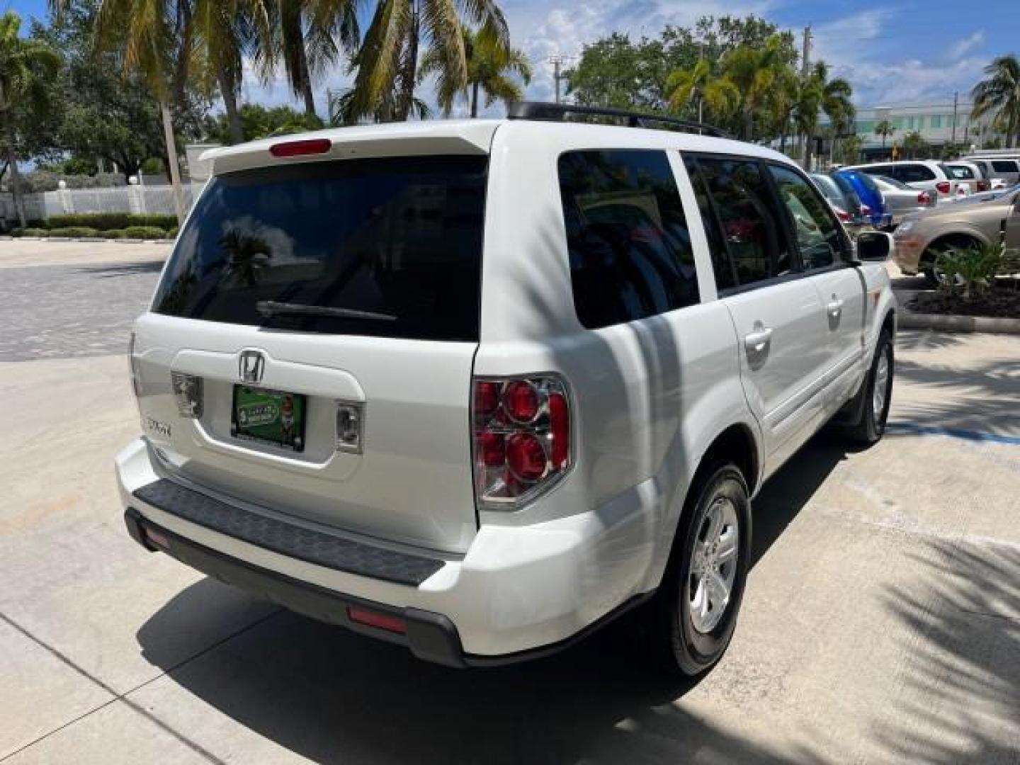 2007 Taffeta White /Saddle Honda Pilot EX LOW MILES 65,235 (5FNYF28417B) with an 3.5L SOHC MPFI 24-Valve i-VTEC V6 Engine engine, Automatic transmission, located at 4701 North Dixie Hwy, Pompano Beach, FL, 33064, (954) 422-2889, 26.240938, -80.123474 - OUR WEBPAGE FLORIDACARS1.COM HAS OVER 100 PHOTOS AND FREE CARFAX LINK 2007 HONDA PILOT EX ROAD READY 3.5L V6 VIN: 5FNYF28417B023674 NO ACCIDENTS 4 DOOR WAGON/SPORT UTILITY NO RECALLS 3.5L V6 F SOHC LOW MILES 65,235 GASOLINE POWER SEARS/MIRRORS 8 SERVICE RECORDS FRONT WHEEL DRIVE FLORIDA OWNER 3 ROW - Photo#90