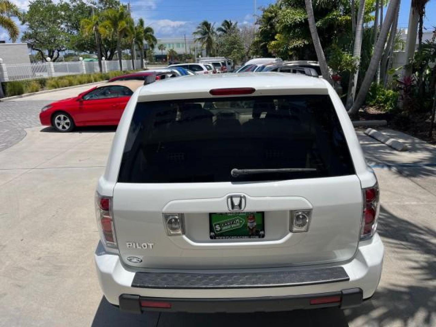 2007 Taffeta White /Saddle Honda Pilot EX LOW MILES 65,235 (5FNYF28417B) with an 3.5L SOHC MPFI 24-Valve i-VTEC V6 Engine engine, Automatic transmission, located at 4701 North Dixie Hwy, Pompano Beach, FL, 33064, (954) 422-2889, 26.240938, -80.123474 - OUR WEBPAGE FLORIDACARS1.COM HAS OVER 100 PHOTOS AND FREE CARFAX LINK 2007 HONDA PILOT EX ROAD READY 3.5L V6 VIN: 5FNYF28417B023674 NO ACCIDENTS 4 DOOR WAGON/SPORT UTILITY NO RECALLS 3.5L V6 F SOHC LOW MILES 65,235 GASOLINE POWER SEARS/MIRRORS 8 SERVICE RECORDS FRONT WHEEL DRIVE FLORIDA OWNER 3 ROW - Photo#98