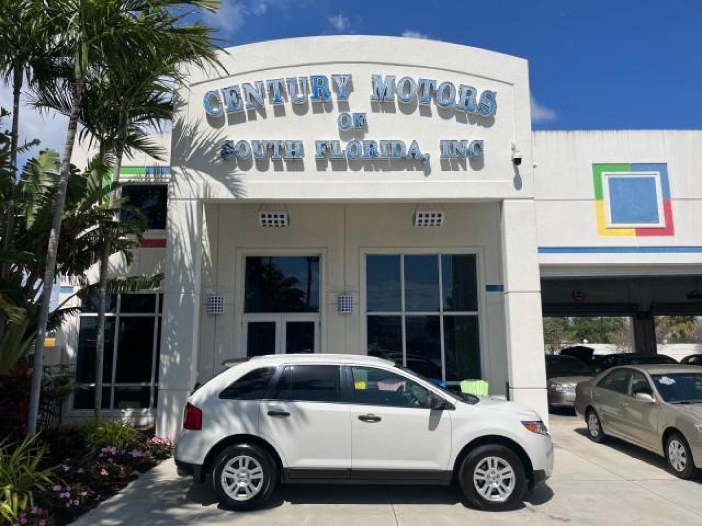 2011 White Suede /Medium Light Stone Ford Edge SE LOW MILES 58,676 (2FMDK3GC8BB) with an 3.5L Ti-VCT V6 Engine engine, Automatic transmission, located at 4701 North Dixie Hwy, Pompano Beach, FL, 33064, (954) 422-2889, 26.240938, -80.123474 - OUR WEBPAGE FLORIDACARS1.COM HAS OVER 100 PHOTOS AND FREE CARFAX LINK 2011 FORD EDGE SE ROAD READY 3.5L V6 VIN: 2FMDK3GC8BBB50285 NO RECALLS 4 DOOR WAGON/SPORT UTILITY FLORIDA OWNER 3.5L V6 F DOHC 24V LOW MILES 58,680 GASOLINE DUAL AC 26 SERVICE RECORDS FRONT WHEEL DRIVE PARK SENSORS LEATHER SEATS A - Photo#0