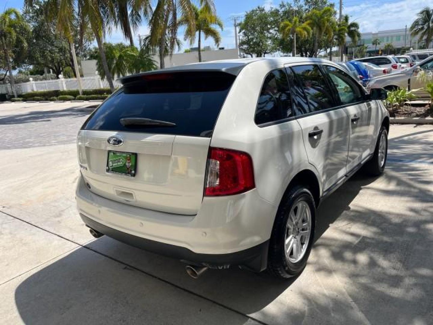 2011 White Suede /Medium Light Stone Ford Edge SE LOW MILES 58,676 (2FMDK3GC8BB) with an 3.5L Ti-VCT V6 Engine engine, Automatic transmission, located at 4701 North Dixie Hwy, Pompano Beach, FL, 33064, (954) 422-2889, 26.240938, -80.123474 - OUR WEBPAGE FLORIDACARS1.COM HAS OVER 100 PHOTOS AND FREE CARFAX LINK 2011 FORD EDGE SE ROAD READY 3.5L V6 VIN: 2FMDK3GC8BBB50285 NO RECALLS 4 DOOR WAGON/SPORT UTILITY FLORIDA OWNER 3.5L V6 F DOHC 24V LOW MILES 58,680 GASOLINE DUAL AC 26 SERVICE RECORDS FRONT WHEEL DRIVE PARK SENSORS LEATHER SEATS A - Photo#7