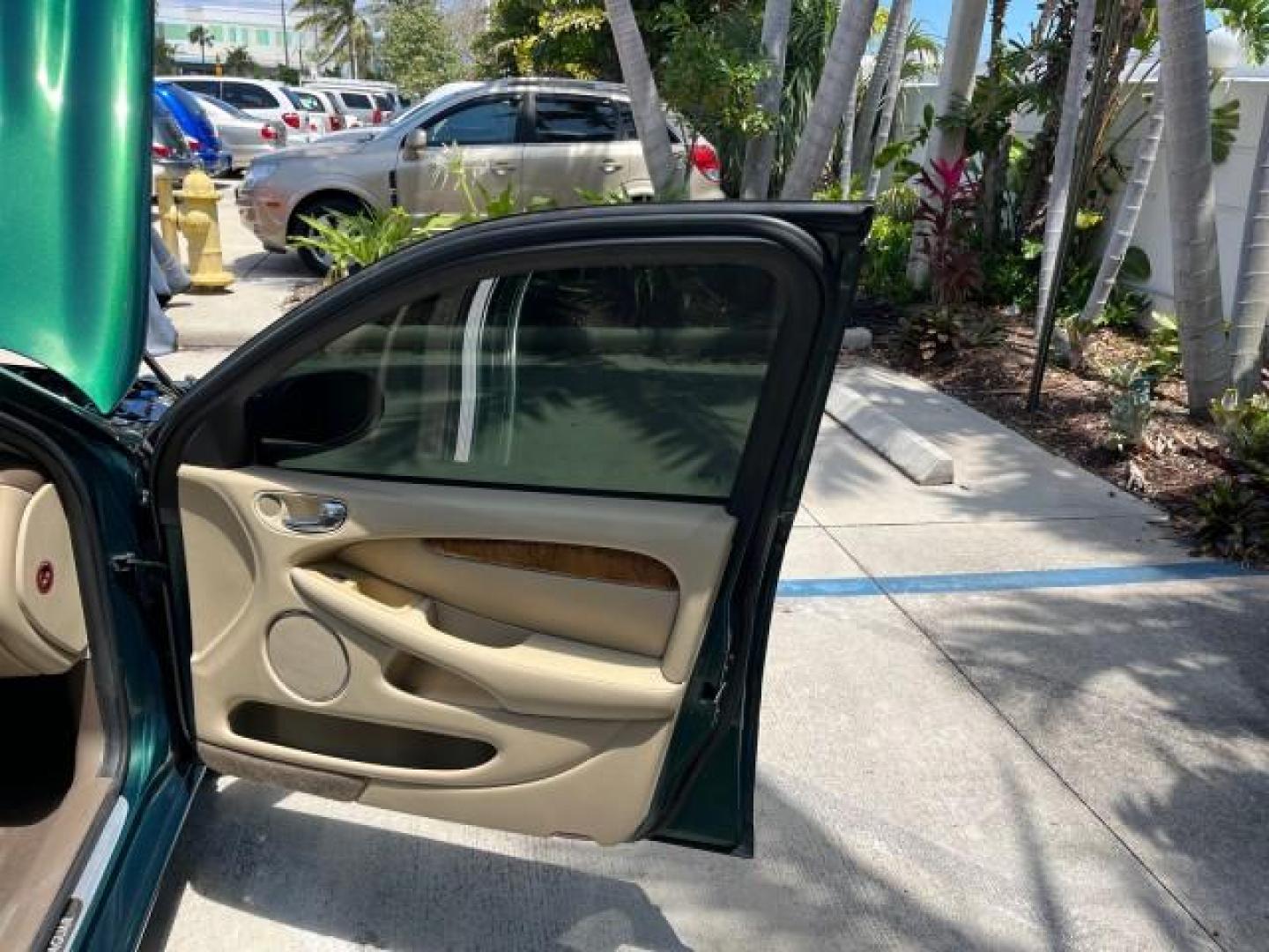 2006 Jaguar Racing Green /Ivory Jaguar X-TYPE AWD LOW MILES 61,609 (SAJWA51A56W) with an 3.0L DOHC SMPI 24-Valve V6 Engine engine, Automatic transmission, located at 4701 North Dixie Hwy, Pompano Beach, FL, 33064, (954) 422-2889, 26.240938, -80.123474 - OUR WEBPAGE FLORIDACARS1.COM HAS OVER 100 PHOTOS AND FREE CARFAX LINK 2006 JAGUAR X-TYPE 3.0L NEW $40,855 ROAD READY VIN: SAJWA51A56WE96399 NO ACCIDENTS NO RECALLS SEDAN 4 DR FLORIDA OWNER 3.0L V6 3.0L V6 F DOHC PARK SENSORS POWER LEATHER SEATS GASOLINE 7 SERVICE RECORDS POWER SUNROOF/MIRRORS ALL WH - Photo#11