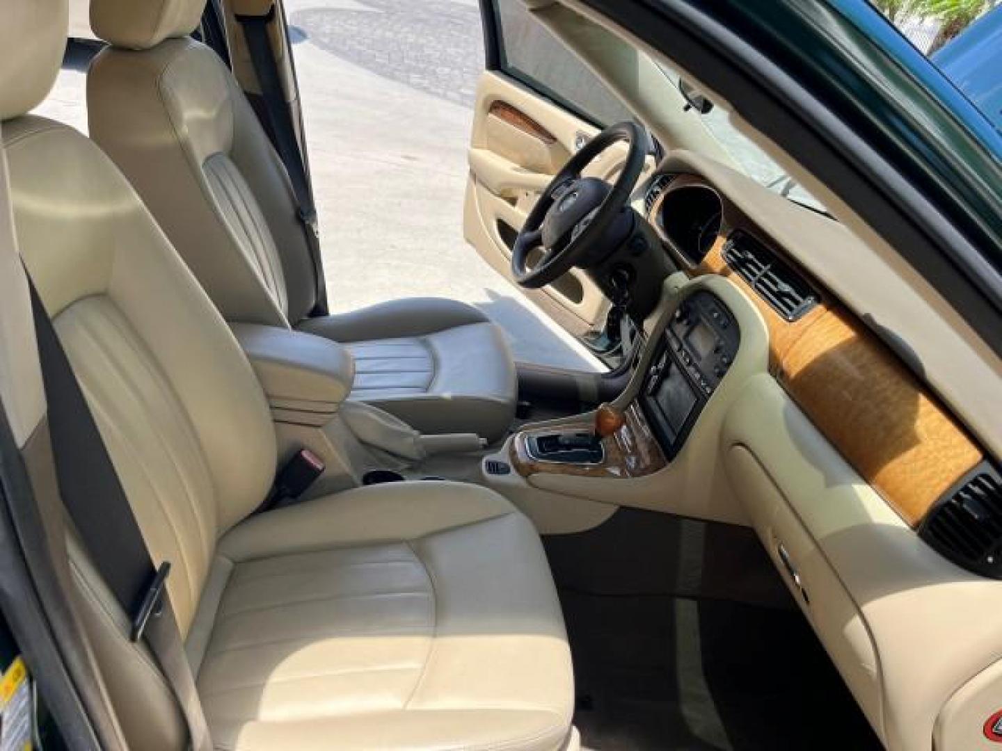 2006 Jaguar Racing Green /Ivory Jaguar X-TYPE AWD LOW MILES 61,609 (SAJWA51A56W) with an 3.0L DOHC SMPI 24-Valve V6 Engine engine, Automatic transmission, located at 4701 North Dixie Hwy, Pompano Beach, FL, 33064, (954) 422-2889, 26.240938, -80.123474 - OUR WEBPAGE FLORIDACARS1.COM HAS OVER 100 PHOTOS AND FREE CARFAX LINK 2006 JAGUAR X-TYPE 3.0L NEW $40,855 ROAD READY VIN: SAJWA51A56WE96399 NO ACCIDENTS NO RECALLS SEDAN 4 DR FLORIDA OWNER 3.0L V6 3.0L V6 F DOHC PARK SENSORS POWER LEATHER SEATS GASOLINE 7 SERVICE RECORDS POWER SUNROOF/MIRRORS ALL WH - Photo#12