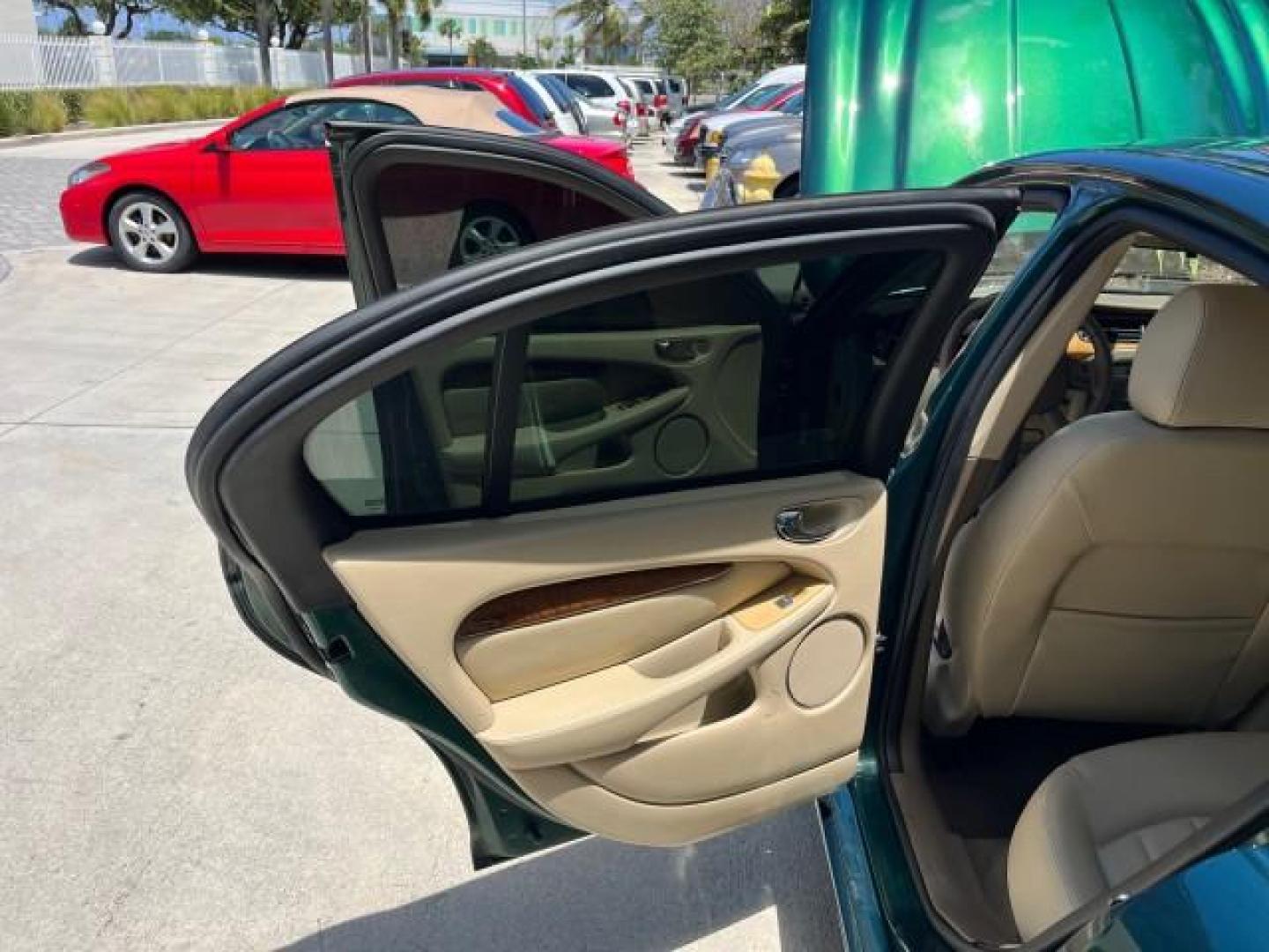 2006 Jaguar Racing Green /Ivory Jaguar X-TYPE AWD LOW MILES 61,609 (SAJWA51A56W) with an 3.0L DOHC SMPI 24-Valve V6 Engine engine, Automatic transmission, located at 4701 North Dixie Hwy, Pompano Beach, FL, 33064, (954) 422-2889, 26.240938, -80.123474 - OUR WEBPAGE FLORIDACARS1.COM HAS OVER 100 PHOTOS AND FREE CARFAX LINK 2006 JAGUAR X-TYPE 3.0L NEW $40,855 ROAD READY VIN: SAJWA51A56WE96399 NO ACCIDENTS NO RECALLS SEDAN 4 DR FLORIDA OWNER 3.0L V6 3.0L V6 F DOHC PARK SENSORS POWER LEATHER SEATS GASOLINE 7 SERVICE RECORDS POWER SUNROOF/MIRRORS ALL WH - Photo#13