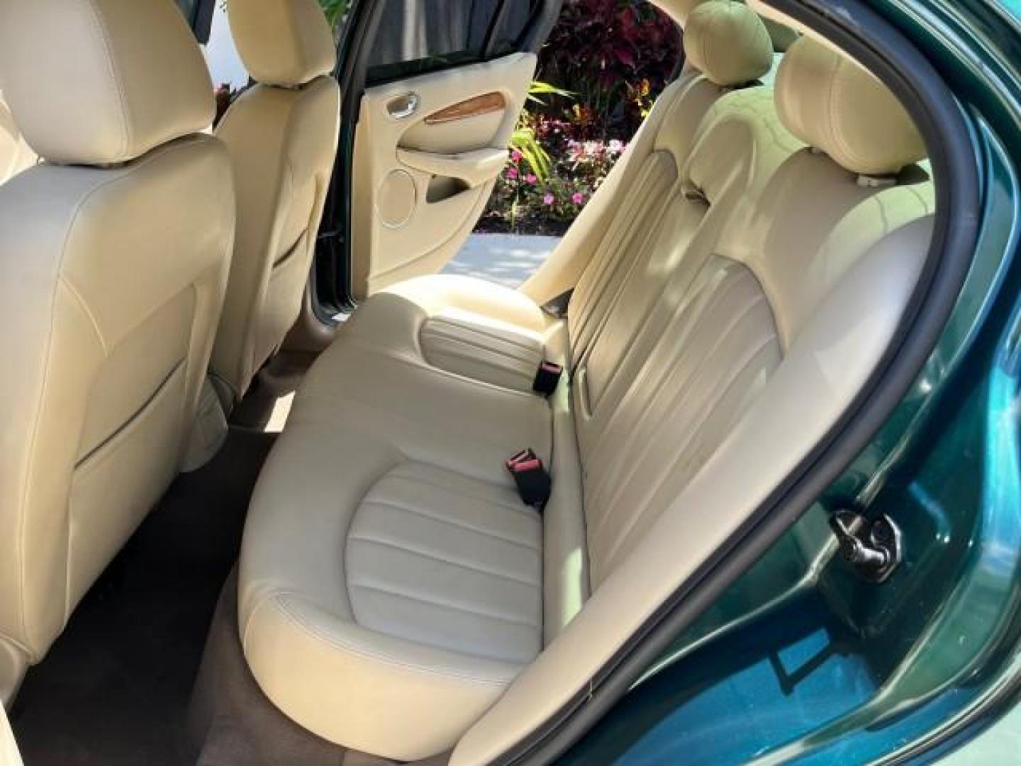 2006 Jaguar Racing Green /Ivory Jaguar X-TYPE AWD LOW MILES 61,609 (SAJWA51A56W) with an 3.0L DOHC SMPI 24-Valve V6 Engine engine, Automatic transmission, located at 4701 North Dixie Hwy, Pompano Beach, FL, 33064, (954) 422-2889, 26.240938, -80.123474 - OUR WEBPAGE FLORIDACARS1.COM HAS OVER 100 PHOTOS AND FREE CARFAX LINK 2006 JAGUAR X-TYPE 3.0L NEW $40,855 ROAD READY VIN: SAJWA51A56WE96399 NO ACCIDENTS NO RECALLS SEDAN 4 DR FLORIDA OWNER 3.0L V6 3.0L V6 F DOHC PARK SENSORS POWER LEATHER SEATS GASOLINE 7 SERVICE RECORDS POWER SUNROOF/MIRRORS ALL WH - Photo#14
