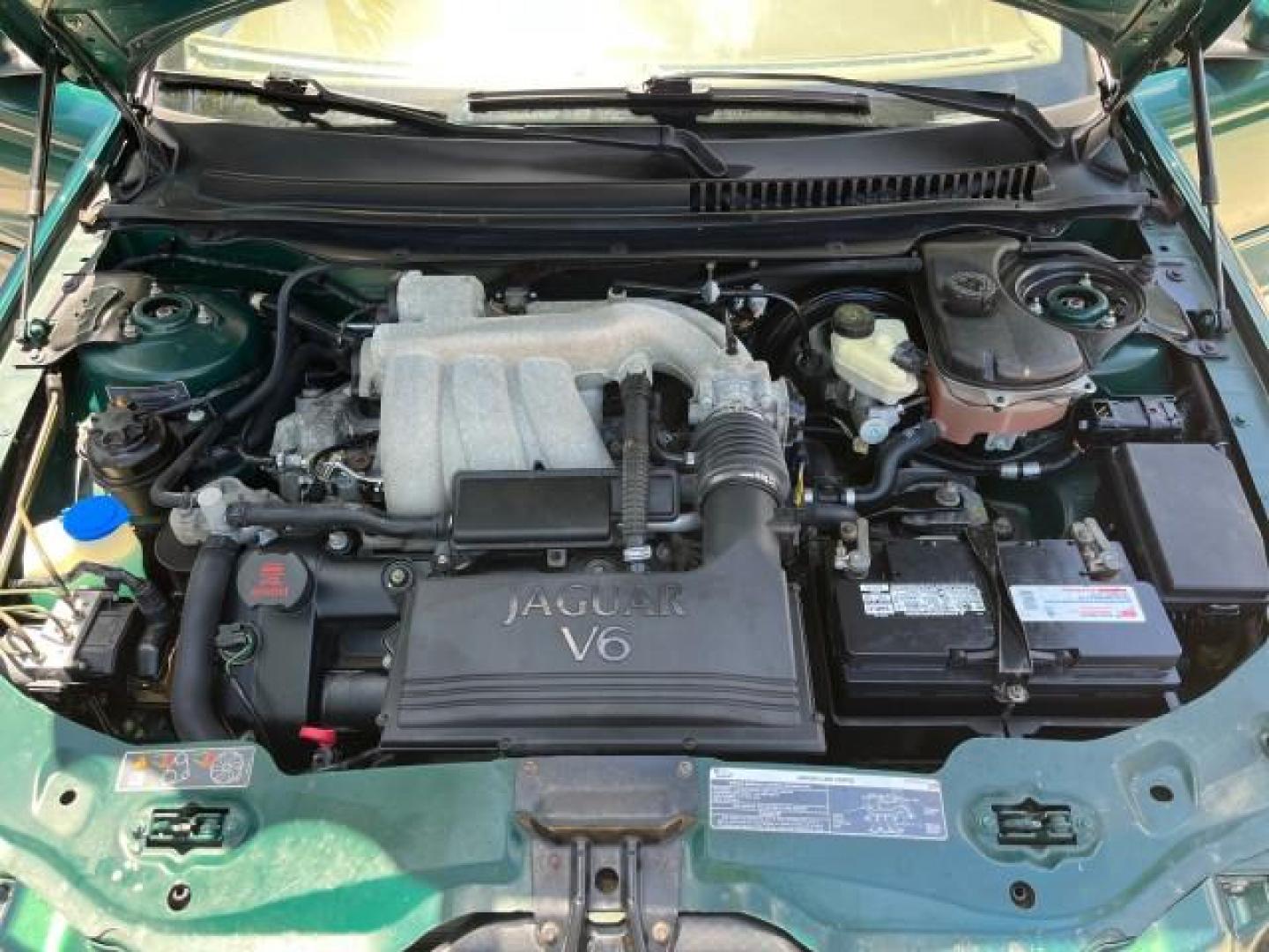 2006 Jaguar Racing Green /Ivory Jaguar X-TYPE AWD LOW MILES 61,609 (SAJWA51A56W) with an 3.0L DOHC SMPI 24-Valve V6 Engine engine, Automatic transmission, located at 4701 North Dixie Hwy, Pompano Beach, FL, 33064, (954) 422-2889, 26.240938, -80.123474 - OUR WEBPAGE FLORIDACARS1.COM HAS OVER 100 PHOTOS AND FREE CARFAX LINK 2006 JAGUAR X-TYPE 3.0L NEW $40,855 ROAD READY VIN: SAJWA51A56WE96399 NO ACCIDENTS NO RECALLS SEDAN 4 DR FLORIDA OWNER 3.0L V6 3.0L V6 F DOHC PARK SENSORS POWER LEATHER SEATS GASOLINE 7 SERVICE RECORDS POWER SUNROOF/MIRRORS ALL WH - Photo#17