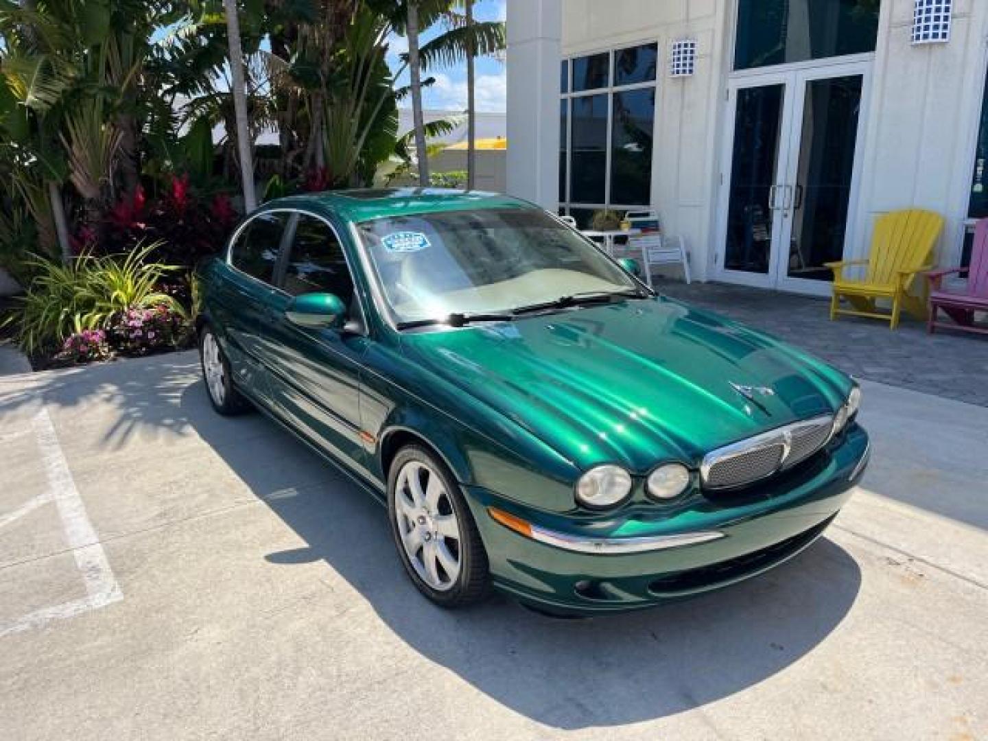 2006 Jaguar Racing Green /Ivory Jaguar X-TYPE AWD LOW MILES 61,609 (SAJWA51A56W) with an 3.0L DOHC SMPI 24-Valve V6 Engine engine, Automatic transmission, located at 4701 North Dixie Hwy, Pompano Beach, FL, 33064, (954) 422-2889, 26.240938, -80.123474 - OUR WEBPAGE FLORIDACARS1.COM HAS OVER 100 PHOTOS AND FREE CARFAX LINK 2006 JAGUAR X-TYPE 3.0L NEW $40,855 ROAD READY VIN: SAJWA51A56WE96399 NO ACCIDENTS NO RECALLS SEDAN 4 DR FLORIDA OWNER 3.0L V6 3.0L V6 F DOHC PARK SENSORS POWER LEATHER SEATS GASOLINE 7 SERVICE RECORDS POWER SUNROOF/MIRRORS ALL WH - Photo#1