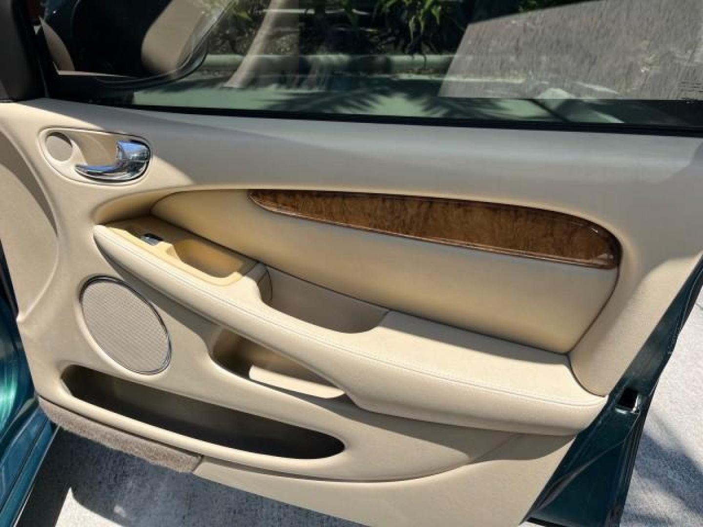 2006 Jaguar Racing Green /Ivory Jaguar X-TYPE AWD LOW MILES 61,609 (SAJWA51A56W) with an 3.0L DOHC SMPI 24-Valve V6 Engine engine, Automatic transmission, located at 4701 North Dixie Hwy, Pompano Beach, FL, 33064, (954) 422-2889, 26.240938, -80.123474 - OUR WEBPAGE FLORIDACARS1.COM HAS OVER 100 PHOTOS AND FREE CARFAX LINK 2006 JAGUAR X-TYPE 3.0L NEW $40,855 ROAD READY VIN: SAJWA51A56WE96399 NO ACCIDENTS NO RECALLS SEDAN 4 DR FLORIDA OWNER 3.0L V6 3.0L V6 F DOHC PARK SENSORS POWER LEATHER SEATS GASOLINE 7 SERVICE RECORDS POWER SUNROOF/MIRRORS ALL WH - Photo#24