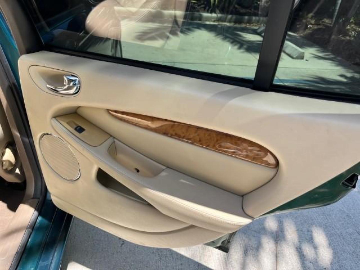 2006 Jaguar Racing Green /Ivory Jaguar X-TYPE AWD LOW MILES 61,609 (SAJWA51A56W) with an 3.0L DOHC SMPI 24-Valve V6 Engine engine, Automatic transmission, located at 4701 North Dixie Hwy, Pompano Beach, FL, 33064, (954) 422-2889, 26.240938, -80.123474 - OUR WEBPAGE FLORIDACARS1.COM HAS OVER 100 PHOTOS AND FREE CARFAX LINK 2006 JAGUAR X-TYPE 3.0L NEW $40,855 ROAD READY VIN: SAJWA51A56WE96399 NO ACCIDENTS NO RECALLS SEDAN 4 DR FLORIDA OWNER 3.0L V6 3.0L V6 F DOHC PARK SENSORS POWER LEATHER SEATS GASOLINE 7 SERVICE RECORDS POWER SUNROOF/MIRRORS ALL WH - Photo#27