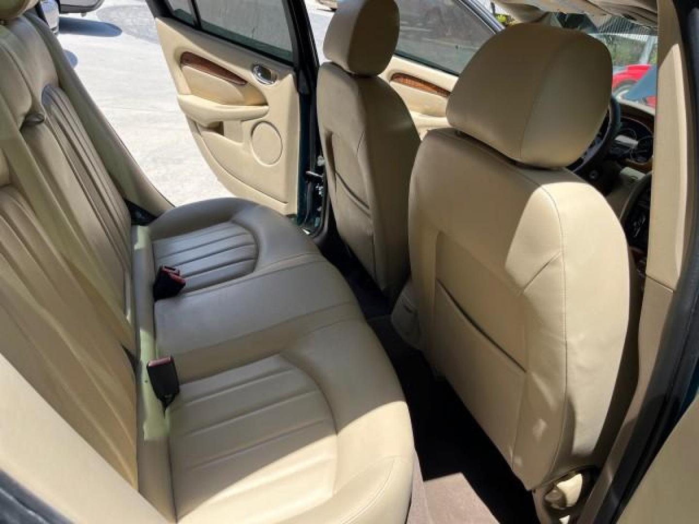2006 Jaguar Racing Green /Ivory Jaguar X-TYPE AWD LOW MILES 61,609 (SAJWA51A56W) with an 3.0L DOHC SMPI 24-Valve V6 Engine engine, Automatic transmission, located at 4701 North Dixie Hwy, Pompano Beach, FL, 33064, (954) 422-2889, 26.240938, -80.123474 - OUR WEBPAGE FLORIDACARS1.COM HAS OVER 100 PHOTOS AND FREE CARFAX LINK 2006 JAGUAR X-TYPE 3.0L NEW $40,855 ROAD READY VIN: SAJWA51A56WE96399 NO ACCIDENTS NO RECALLS SEDAN 4 DR FLORIDA OWNER 3.0L V6 3.0L V6 F DOHC PARK SENSORS POWER LEATHER SEATS GASOLINE 7 SERVICE RECORDS POWER SUNROOF/MIRRORS ALL WH - Photo#28