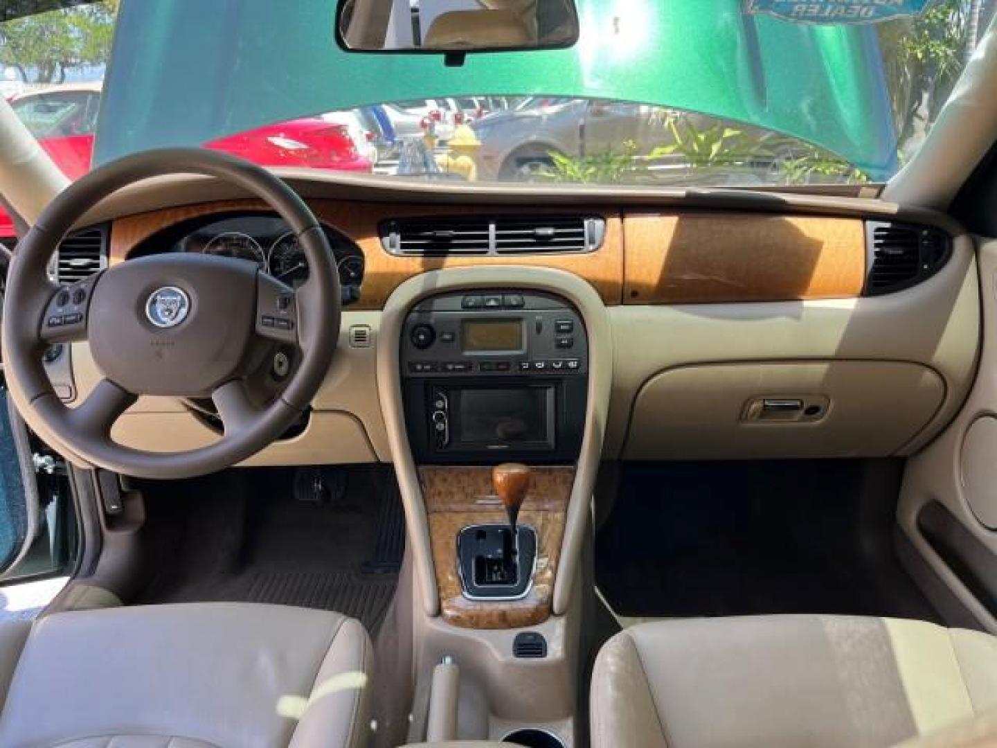 2006 Jaguar Racing Green /Ivory Jaguar X-TYPE AWD LOW MILES 61,609 (SAJWA51A56W) with an 3.0L DOHC SMPI 24-Valve V6 Engine engine, Automatic transmission, located at 4701 North Dixie Hwy, Pompano Beach, FL, 33064, (954) 422-2889, 26.240938, -80.123474 - OUR WEBPAGE FLORIDACARS1.COM HAS OVER 100 PHOTOS AND FREE CARFAX LINK 2006 JAGUAR X-TYPE 3.0L NEW $40,855 ROAD READY VIN: SAJWA51A56WE96399 NO ACCIDENTS NO RECALLS SEDAN 4 DR FLORIDA OWNER 3.0L V6 3.0L V6 F DOHC PARK SENSORS POWER LEATHER SEATS GASOLINE 7 SERVICE RECORDS POWER SUNROOF/MIRRORS ALL WH - Photo#29