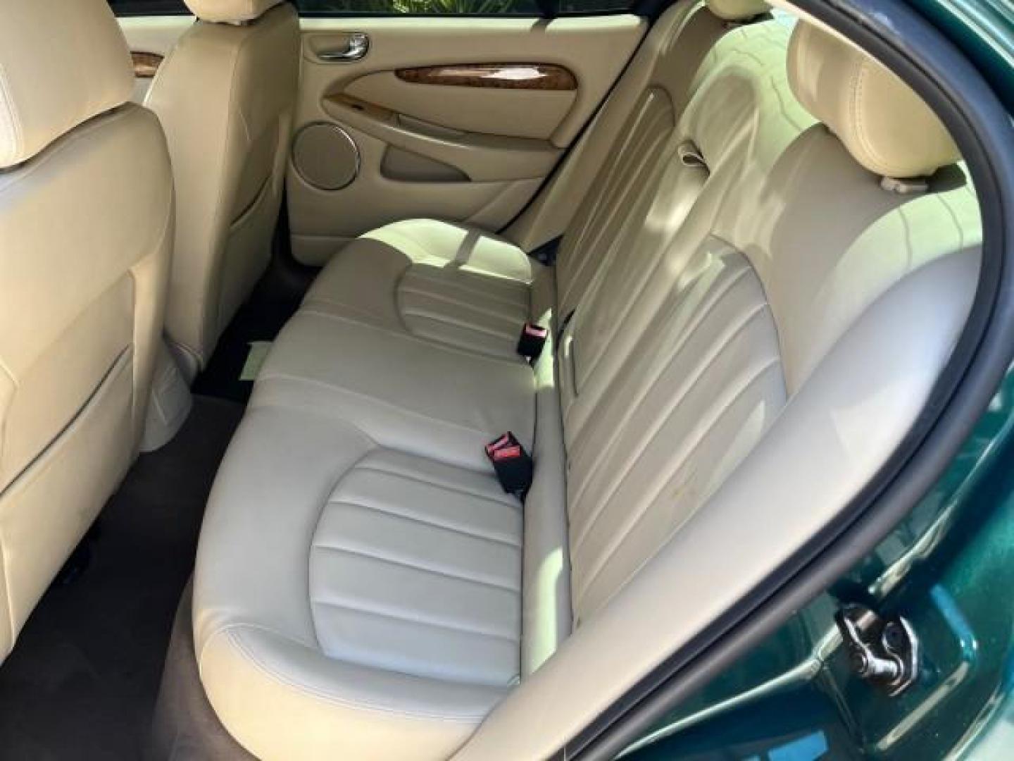 2006 Jaguar Racing Green /Ivory Jaguar X-TYPE AWD LOW MILES 61,609 (SAJWA51A56W) with an 3.0L DOHC SMPI 24-Valve V6 Engine engine, Automatic transmission, located at 4701 North Dixie Hwy, Pompano Beach, FL, 33064, (954) 422-2889, 26.240938, -80.123474 - OUR WEBPAGE FLORIDACARS1.COM HAS OVER 100 PHOTOS AND FREE CARFAX LINK 2006 JAGUAR X-TYPE 3.0L NEW $40,855 ROAD READY VIN: SAJWA51A56WE96399 NO ACCIDENTS NO RECALLS SEDAN 4 DR FLORIDA OWNER 3.0L V6 3.0L V6 F DOHC PARK SENSORS POWER LEATHER SEATS GASOLINE 7 SERVICE RECORDS POWER SUNROOF/MIRRORS ALL WH - Photo#32
