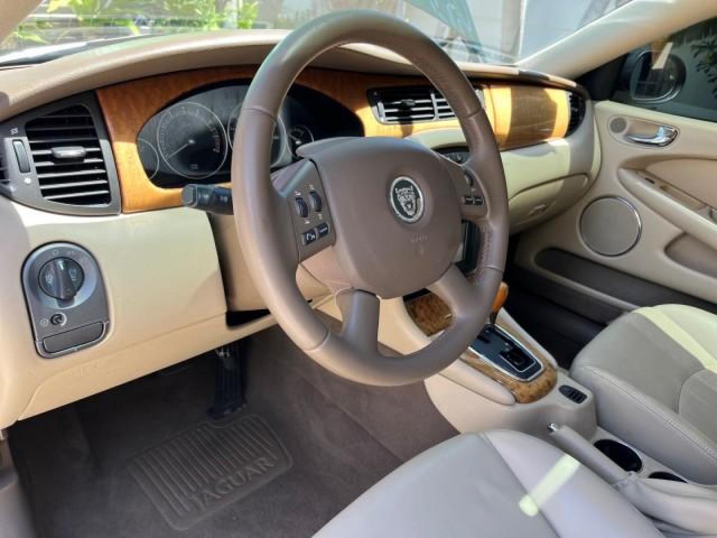 2006 Jaguar Racing Green /Ivory Jaguar X-TYPE AWD LOW MILES 61,609 (SAJWA51A56W) with an 3.0L DOHC SMPI 24-Valve V6 Engine engine, Automatic transmission, located at 4701 North Dixie Hwy, Pompano Beach, FL, 33064, (954) 422-2889, 26.240938, -80.123474 - OUR WEBPAGE FLORIDACARS1.COM HAS OVER 100 PHOTOS AND FREE CARFAX LINK 2006 JAGUAR X-TYPE 3.0L NEW $40,855 ROAD READY VIN: SAJWA51A56WE96399 NO ACCIDENTS NO RECALLS SEDAN 4 DR FLORIDA OWNER 3.0L V6 3.0L V6 F DOHC PARK SENSORS POWER LEATHER SEATS GASOLINE 7 SERVICE RECORDS POWER SUNROOF/MIRRORS ALL WH - Photo#36