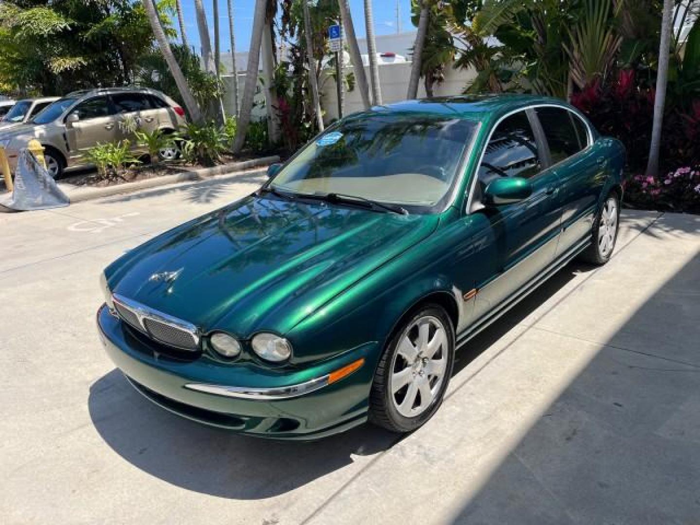2006 Jaguar Racing Green /Ivory Jaguar X-TYPE AWD LOW MILES 61,609 (SAJWA51A56W) with an 3.0L DOHC SMPI 24-Valve V6 Engine engine, Automatic transmission, located at 4701 North Dixie Hwy, Pompano Beach, FL, 33064, (954) 422-2889, 26.240938, -80.123474 - OUR WEBPAGE FLORIDACARS1.COM HAS OVER 100 PHOTOS AND FREE CARFAX LINK 2006 JAGUAR X-TYPE 3.0L NEW $40,855 ROAD READY VIN: SAJWA51A56WE96399 NO ACCIDENTS NO RECALLS SEDAN 4 DR FLORIDA OWNER 3.0L V6 3.0L V6 F DOHC PARK SENSORS POWER LEATHER SEATS GASOLINE 7 SERVICE RECORDS POWER SUNROOF/MIRRORS ALL WH - Photo#3