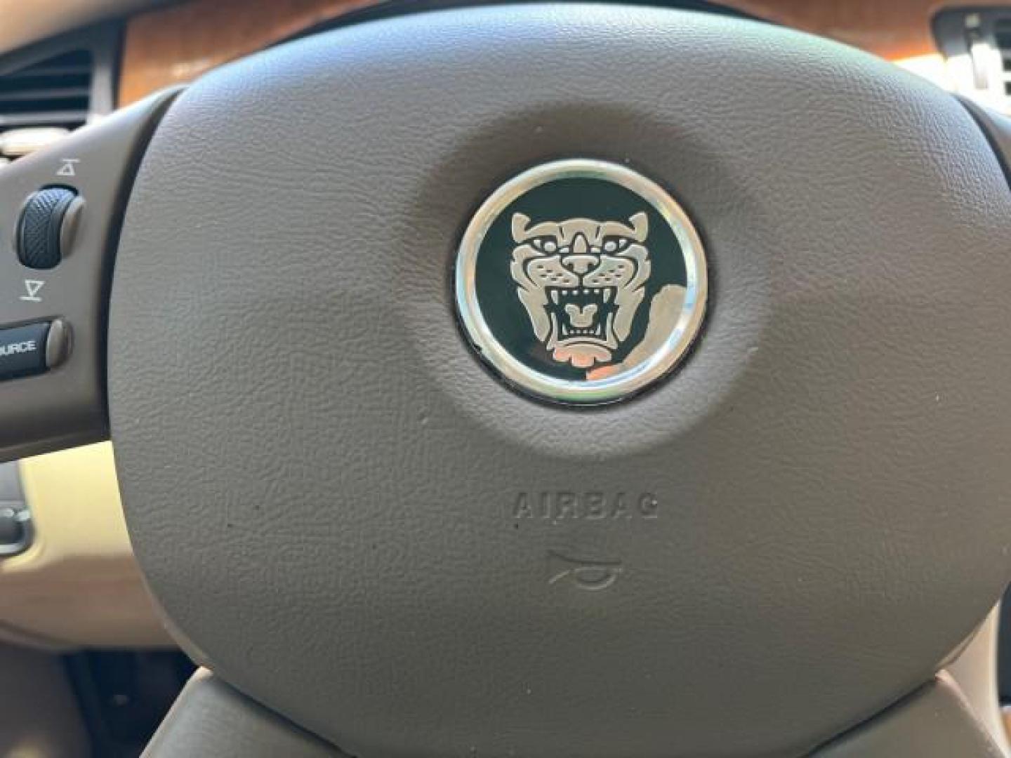 2006 Jaguar Racing Green /Ivory Jaguar X-TYPE AWD LOW MILES 61,609 (SAJWA51A56W) with an 3.0L DOHC SMPI 24-Valve V6 Engine engine, Automatic transmission, located at 4701 North Dixie Hwy, Pompano Beach, FL, 33064, (954) 422-2889, 26.240938, -80.123474 - OUR WEBPAGE FLORIDACARS1.COM HAS OVER 100 PHOTOS AND FREE CARFAX LINK 2006 JAGUAR X-TYPE 3.0L NEW $40,855 ROAD READY VIN: SAJWA51A56WE96399 NO ACCIDENTS NO RECALLS SEDAN 4 DR FLORIDA OWNER 3.0L V6 3.0L V6 F DOHC PARK SENSORS POWER LEATHER SEATS GASOLINE 7 SERVICE RECORDS POWER SUNROOF/MIRRORS ALL WH - Photo#39
