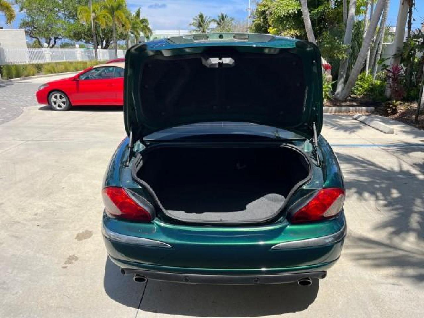 2006 Jaguar Racing Green /Ivory Jaguar X-TYPE AWD LOW MILES 61,609 (SAJWA51A56W) with an 3.0L DOHC SMPI 24-Valve V6 Engine engine, Automatic transmission, located at 4701 North Dixie Hwy, Pompano Beach, FL, 33064, (954) 422-2889, 26.240938, -80.123474 - OUR WEBPAGE FLORIDACARS1.COM HAS OVER 100 PHOTOS AND FREE CARFAX LINK 2006 JAGUAR X-TYPE 3.0L NEW $40,855 ROAD READY VIN: SAJWA51A56WE96399 NO ACCIDENTS NO RECALLS SEDAN 4 DR FLORIDA OWNER 3.0L V6 3.0L V6 F DOHC PARK SENSORS POWER LEATHER SEATS GASOLINE 7 SERVICE RECORDS POWER SUNROOF/MIRRORS ALL WH - Photo#48