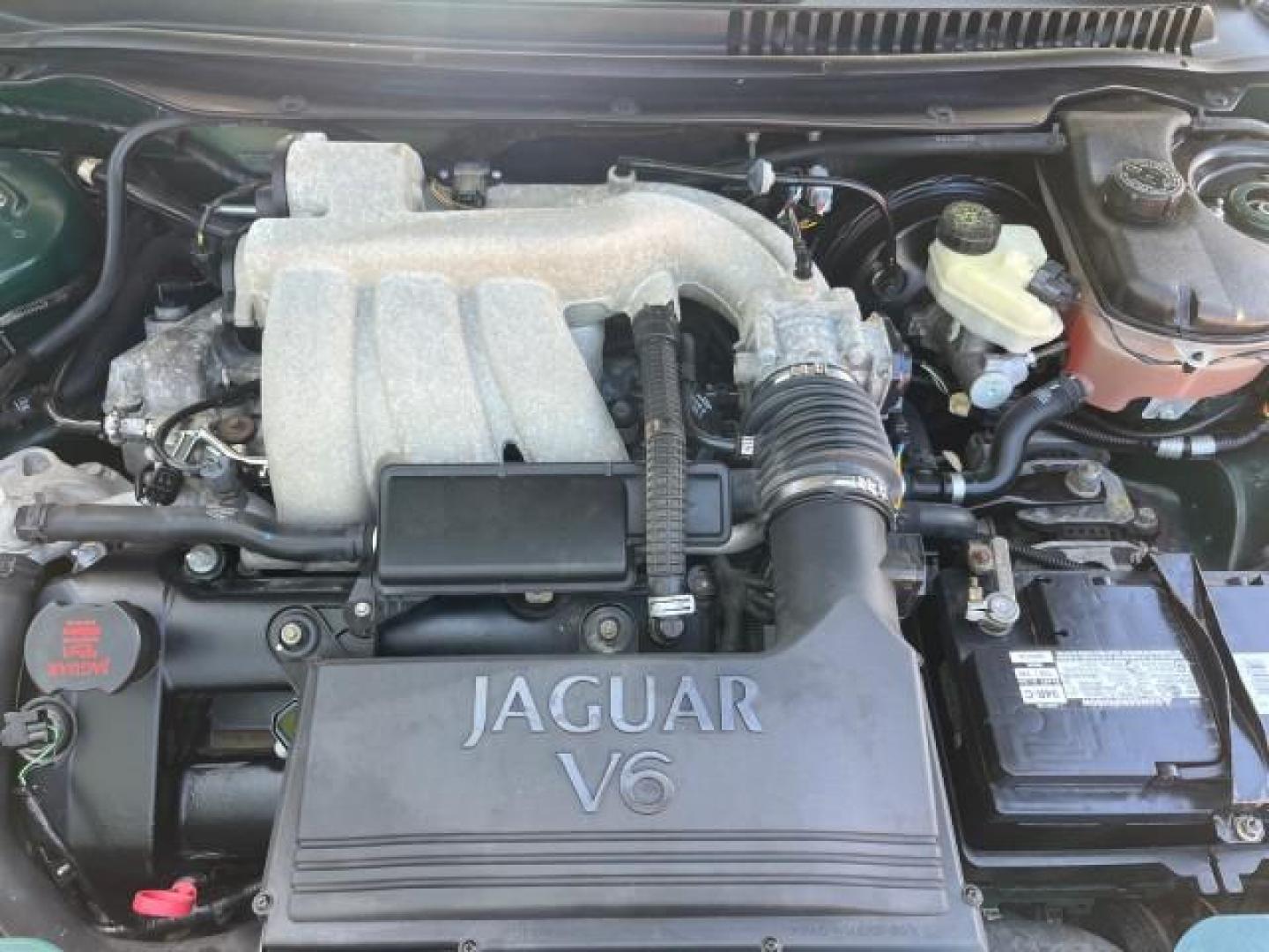 2006 Jaguar Racing Green /Ivory Jaguar X-TYPE AWD LOW MILES 61,609 (SAJWA51A56W) with an 3.0L DOHC SMPI 24-Valve V6 Engine engine, Automatic transmission, located at 4701 North Dixie Hwy, Pompano Beach, FL, 33064, (954) 422-2889, 26.240938, -80.123474 - OUR WEBPAGE FLORIDACARS1.COM HAS OVER 100 PHOTOS AND FREE CARFAX LINK 2006 JAGUAR X-TYPE 3.0L NEW $40,855 ROAD READY VIN: SAJWA51A56WE96399 NO ACCIDENTS NO RECALLS SEDAN 4 DR FLORIDA OWNER 3.0L V6 3.0L V6 F DOHC PARK SENSORS POWER LEATHER SEATS GASOLINE 7 SERVICE RECORDS POWER SUNROOF/MIRRORS ALL WH - Photo#52