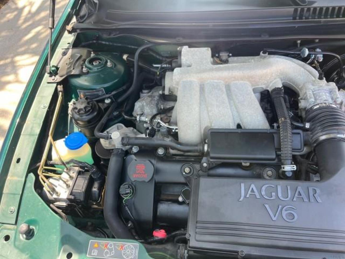 2006 Jaguar Racing Green /Ivory Jaguar X-TYPE AWD LOW MILES 61,609 (SAJWA51A56W) with an 3.0L DOHC SMPI 24-Valve V6 Engine engine, Automatic transmission, located at 4701 North Dixie Hwy, Pompano Beach, FL, 33064, (954) 422-2889, 26.240938, -80.123474 - OUR WEBPAGE FLORIDACARS1.COM HAS OVER 100 PHOTOS AND FREE CARFAX LINK 2006 JAGUAR X-TYPE 3.0L NEW $40,855 ROAD READY VIN: SAJWA51A56WE96399 NO ACCIDENTS NO RECALLS SEDAN 4 DR FLORIDA OWNER 3.0L V6 3.0L V6 F DOHC PARK SENSORS POWER LEATHER SEATS GASOLINE 7 SERVICE RECORDS POWER SUNROOF/MIRRORS ALL WH - Photo#53