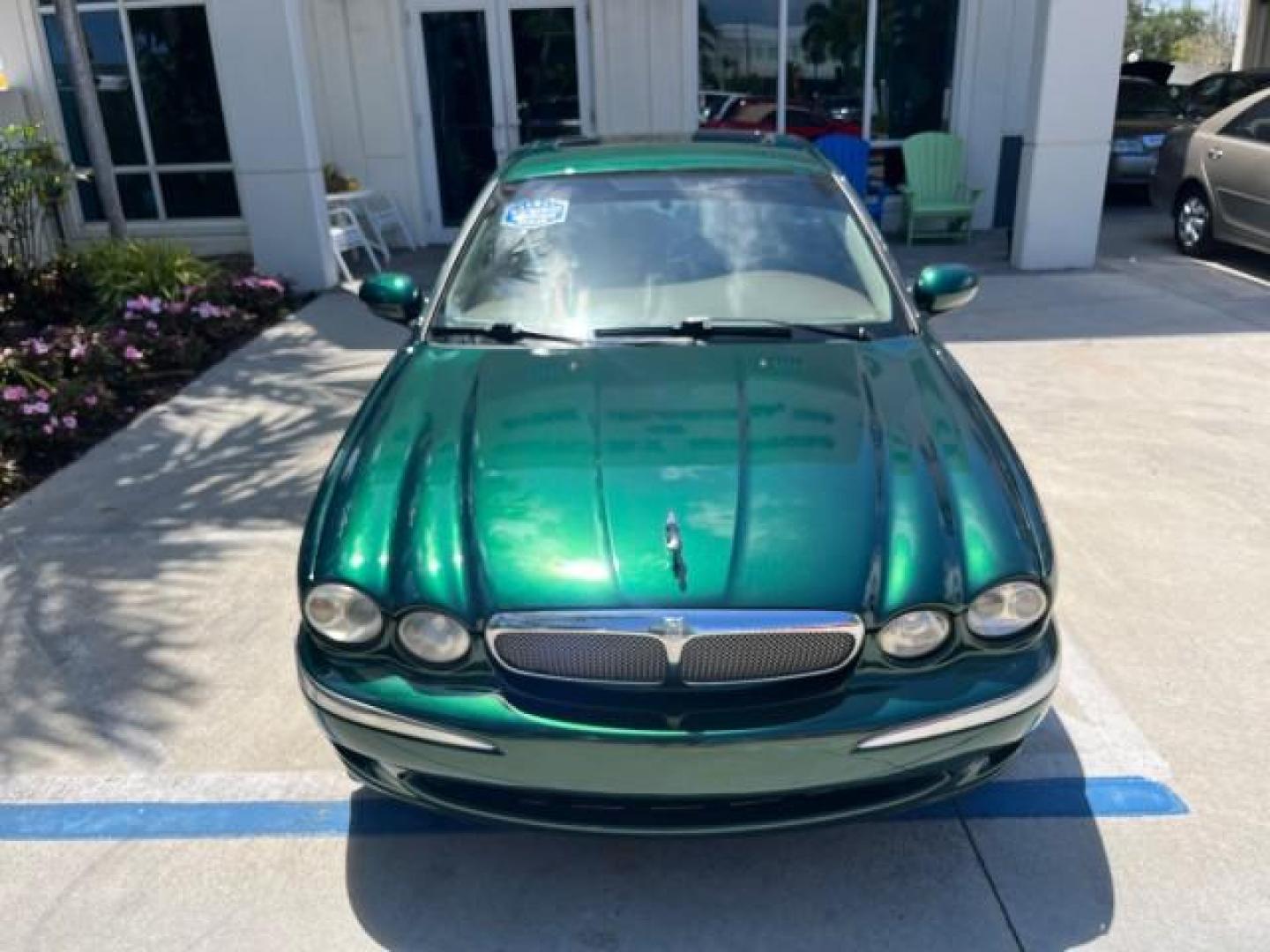 2006 Jaguar Racing Green /Ivory Jaguar X-TYPE AWD LOW MILES 61,609 (SAJWA51A56W) with an 3.0L DOHC SMPI 24-Valve V6 Engine engine, Automatic transmission, located at 4701 North Dixie Hwy, Pompano Beach, FL, 33064, (954) 422-2889, 26.240938, -80.123474 - OUR WEBPAGE FLORIDACARS1.COM HAS OVER 100 PHOTOS AND FREE CARFAX LINK 2006 JAGUAR X-TYPE 3.0L NEW $40,855 ROAD READY VIN: SAJWA51A56WE96399 NO ACCIDENTS NO RECALLS SEDAN 4 DR FLORIDA OWNER 3.0L V6 3.0L V6 F DOHC PARK SENSORS POWER LEATHER SEATS GASOLINE 7 SERVICE RECORDS POWER SUNROOF/MIRRORS ALL WH - Photo#55