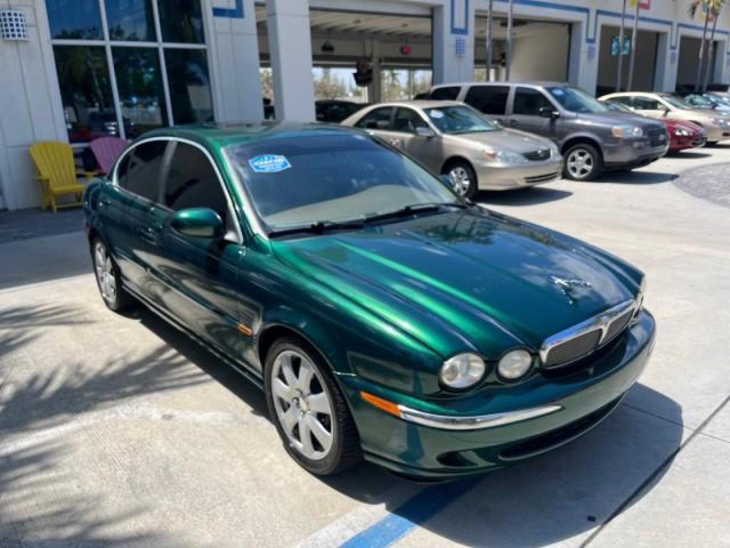2006 Jaguar Racing Green /Ivory Jaguar X-TYPE AWD LOW MILES 61,609 (SAJWA51A56W) with an 3.0L DOHC SMPI 24-Valve V6 Engine engine, Automatic transmission, located at 4701 North Dixie Hwy, Pompano Beach, FL, 33064, (954) 422-2889, 26.240938, -80.123474 - OUR WEBPAGE FLORIDACARS1.COM HAS OVER 100 PHOTOS AND FREE CARFAX LINK 2006 JAGUAR X-TYPE 3.0L NEW $40,855 ROAD READY VIN: SAJWA51A56WE96399 NO ACCIDENTS NO RECALLS SEDAN 4 DR FLORIDA OWNER 3.0L V6 3.0L V6 F DOHC PARK SENSORS POWER LEATHER SEATS GASOLINE 7 SERVICE RECORDS POWER SUNROOF/MIRRORS ALL WH - Photo#56