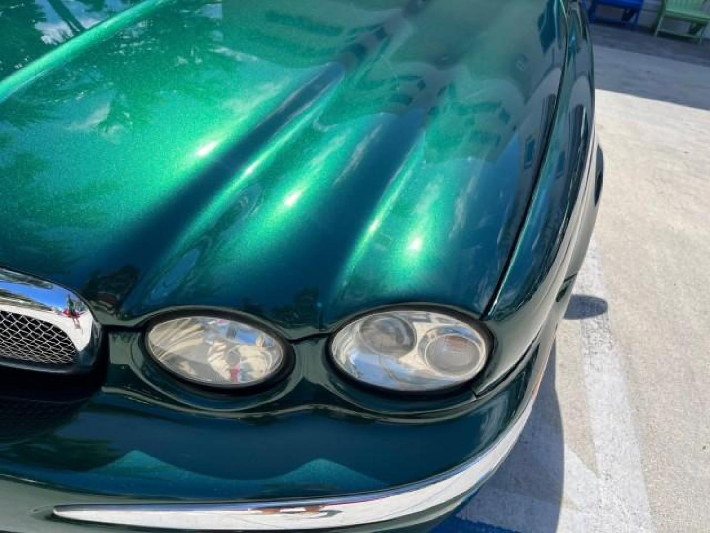 2006 Jaguar Racing Green /Ivory Jaguar X-TYPE AWD LOW MILES 61,609 (SAJWA51A56W) with an 3.0L DOHC SMPI 24-Valve V6 Engine engine, Automatic transmission, located at 4701 North Dixie Hwy, Pompano Beach, FL, 33064, (954) 422-2889, 26.240938, -80.123474 - OUR WEBPAGE FLORIDACARS1.COM HAS OVER 100 PHOTOS AND FREE CARFAX LINK 2006 JAGUAR X-TYPE 3.0L NEW $40,855 ROAD READY VIN: SAJWA51A56WE96399 NO ACCIDENTS NO RECALLS SEDAN 4 DR FLORIDA OWNER 3.0L V6 3.0L V6 F DOHC PARK SENSORS POWER LEATHER SEATS GASOLINE 7 SERVICE RECORDS POWER SUNROOF/MIRRORS ALL WH - Photo#58