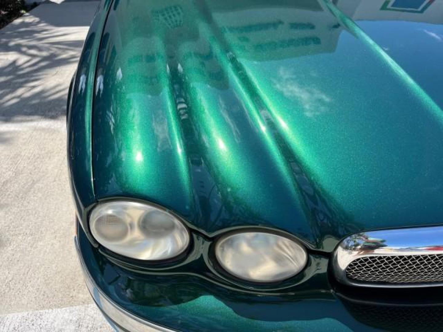 2006 Jaguar Racing Green /Ivory Jaguar X-TYPE AWD LOW MILES 61,609 (SAJWA51A56W) with an 3.0L DOHC SMPI 24-Valve V6 Engine engine, Automatic transmission, located at 4701 North Dixie Hwy, Pompano Beach, FL, 33064, (954) 422-2889, 26.240938, -80.123474 - OUR WEBPAGE FLORIDACARS1.COM HAS OVER 100 PHOTOS AND FREE CARFAX LINK 2006 JAGUAR X-TYPE 3.0L NEW $40,855 ROAD READY VIN: SAJWA51A56WE96399 NO ACCIDENTS NO RECALLS SEDAN 4 DR FLORIDA OWNER 3.0L V6 3.0L V6 F DOHC PARK SENSORS POWER LEATHER SEATS GASOLINE 7 SERVICE RECORDS POWER SUNROOF/MIRRORS ALL WH - Photo#59
