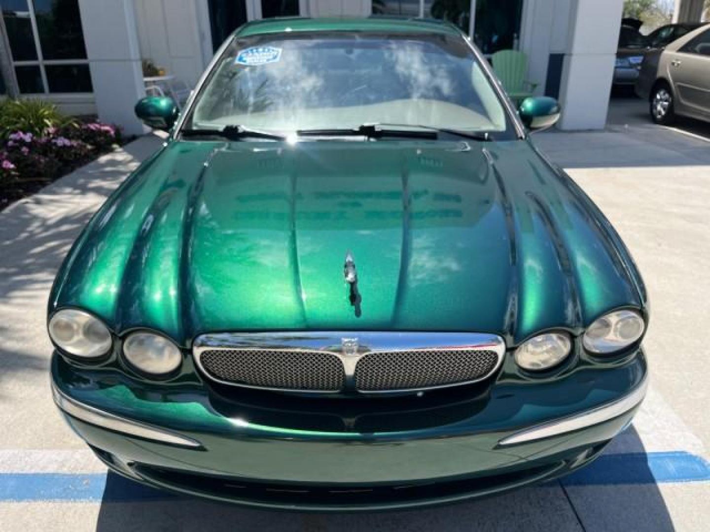 2006 Jaguar Racing Green /Ivory Jaguar X-TYPE AWD LOW MILES 61,609 (SAJWA51A56W) with an 3.0L DOHC SMPI 24-Valve V6 Engine engine, Automatic transmission, located at 4701 North Dixie Hwy, Pompano Beach, FL, 33064, (954) 422-2889, 26.240938, -80.123474 - OUR WEBPAGE FLORIDACARS1.COM HAS OVER 100 PHOTOS AND FREE CARFAX LINK 2006 JAGUAR X-TYPE 3.0L NEW $40,855 ROAD READY VIN: SAJWA51A56WE96399 NO ACCIDENTS NO RECALLS SEDAN 4 DR FLORIDA OWNER 3.0L V6 3.0L V6 F DOHC PARK SENSORS POWER LEATHER SEATS GASOLINE 7 SERVICE RECORDS POWER SUNROOF/MIRRORS ALL WH - Photo#61