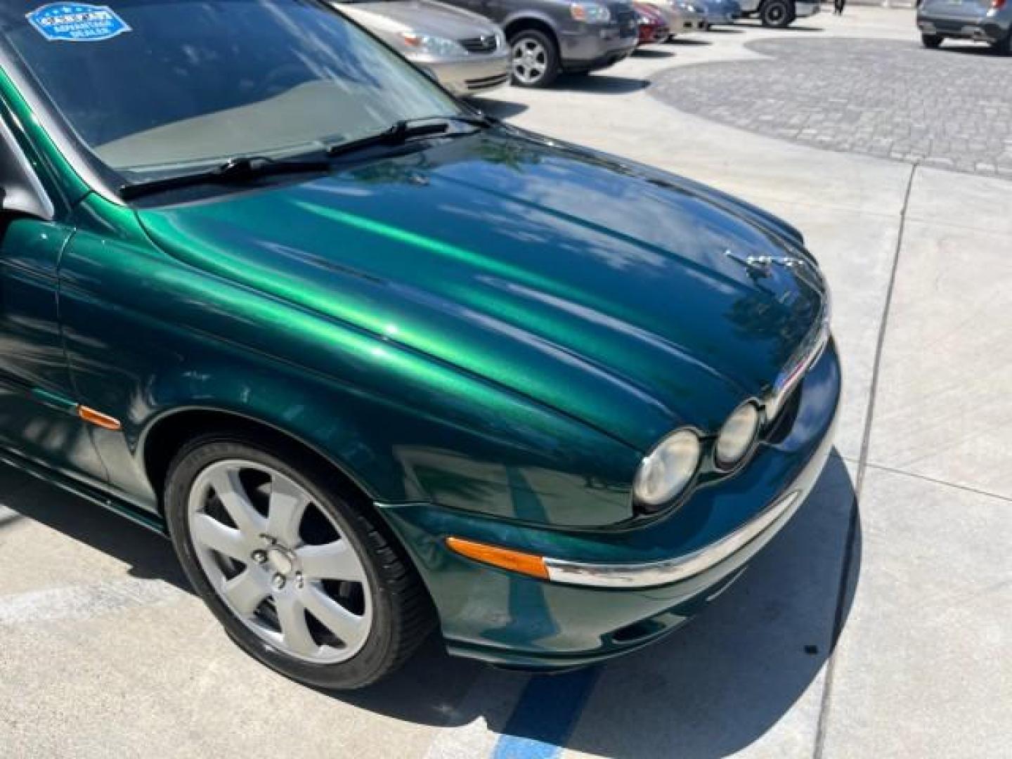2006 Jaguar Racing Green /Ivory Jaguar X-TYPE AWD LOW MILES 61,609 (SAJWA51A56W) with an 3.0L DOHC SMPI 24-Valve V6 Engine engine, Automatic transmission, located at 4701 North Dixie Hwy, Pompano Beach, FL, 33064, (954) 422-2889, 26.240938, -80.123474 - OUR WEBPAGE FLORIDACARS1.COM HAS OVER 100 PHOTOS AND FREE CARFAX LINK 2006 JAGUAR X-TYPE 3.0L NEW $40,855 ROAD READY VIN: SAJWA51A56WE96399 NO ACCIDENTS NO RECALLS SEDAN 4 DR FLORIDA OWNER 3.0L V6 3.0L V6 F DOHC PARK SENSORS POWER LEATHER SEATS GASOLINE 7 SERVICE RECORDS POWER SUNROOF/MIRRORS ALL WH - Photo#62